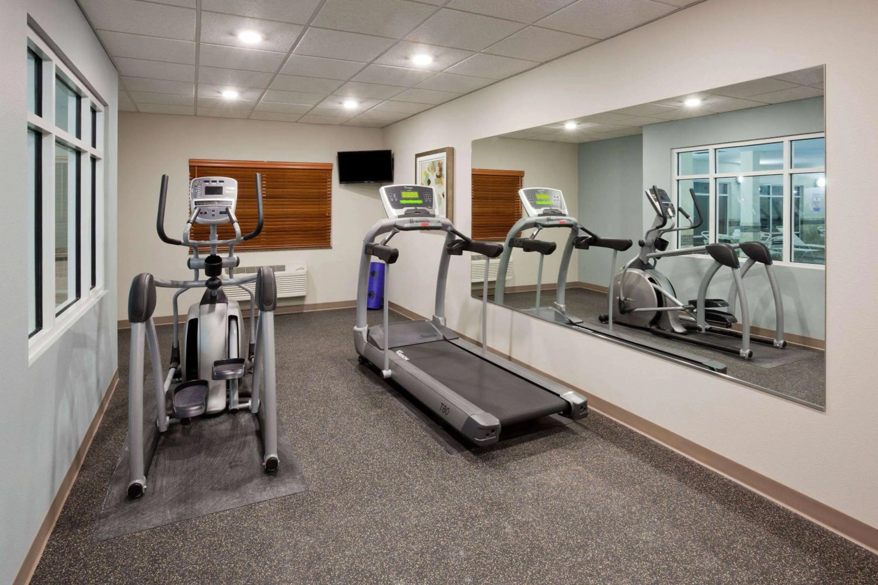 Fitness centre/facilities in AmericInn by Wyndham Sibley