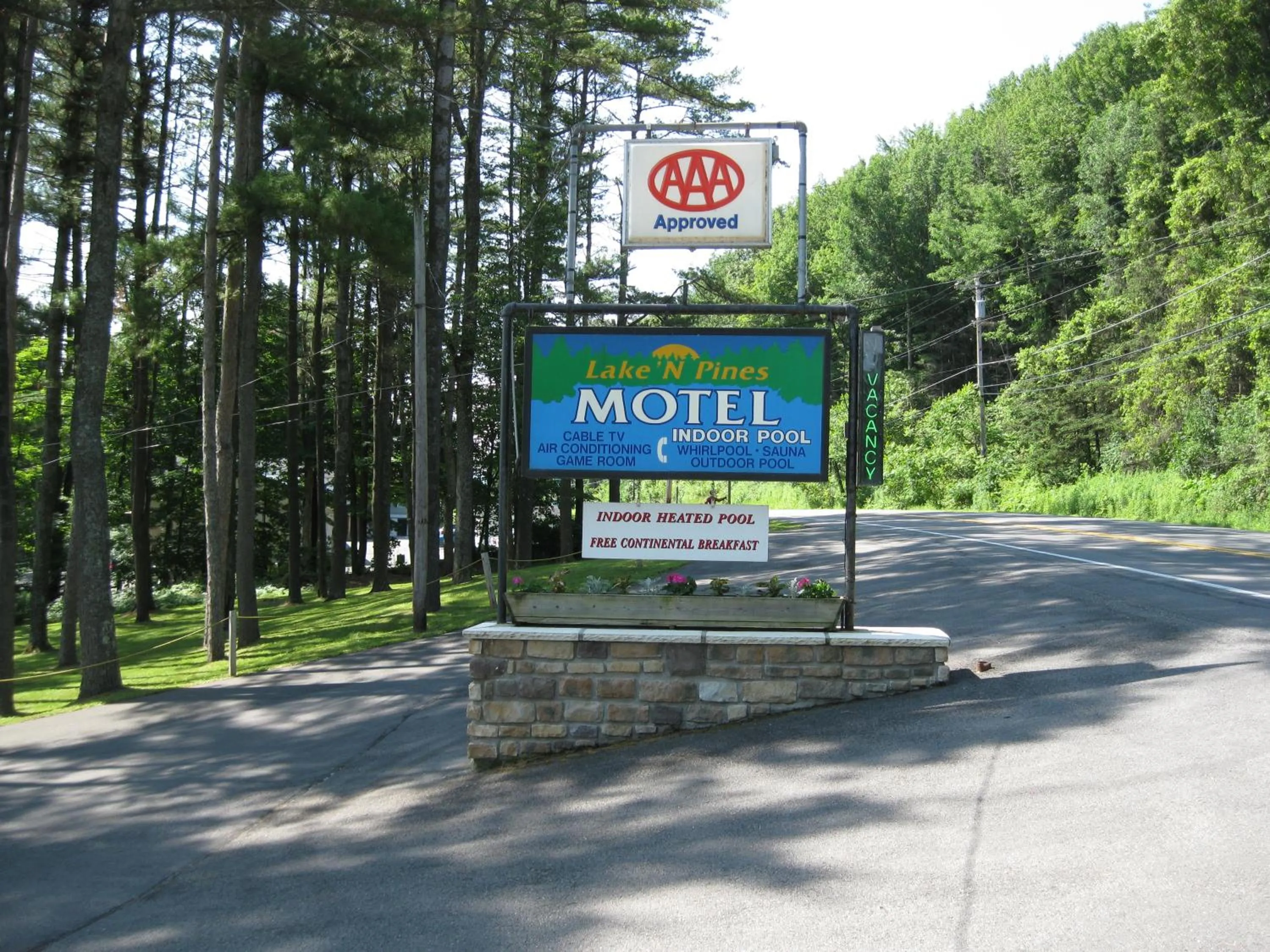 Property logo or sign in Lake 'N Pines Motel