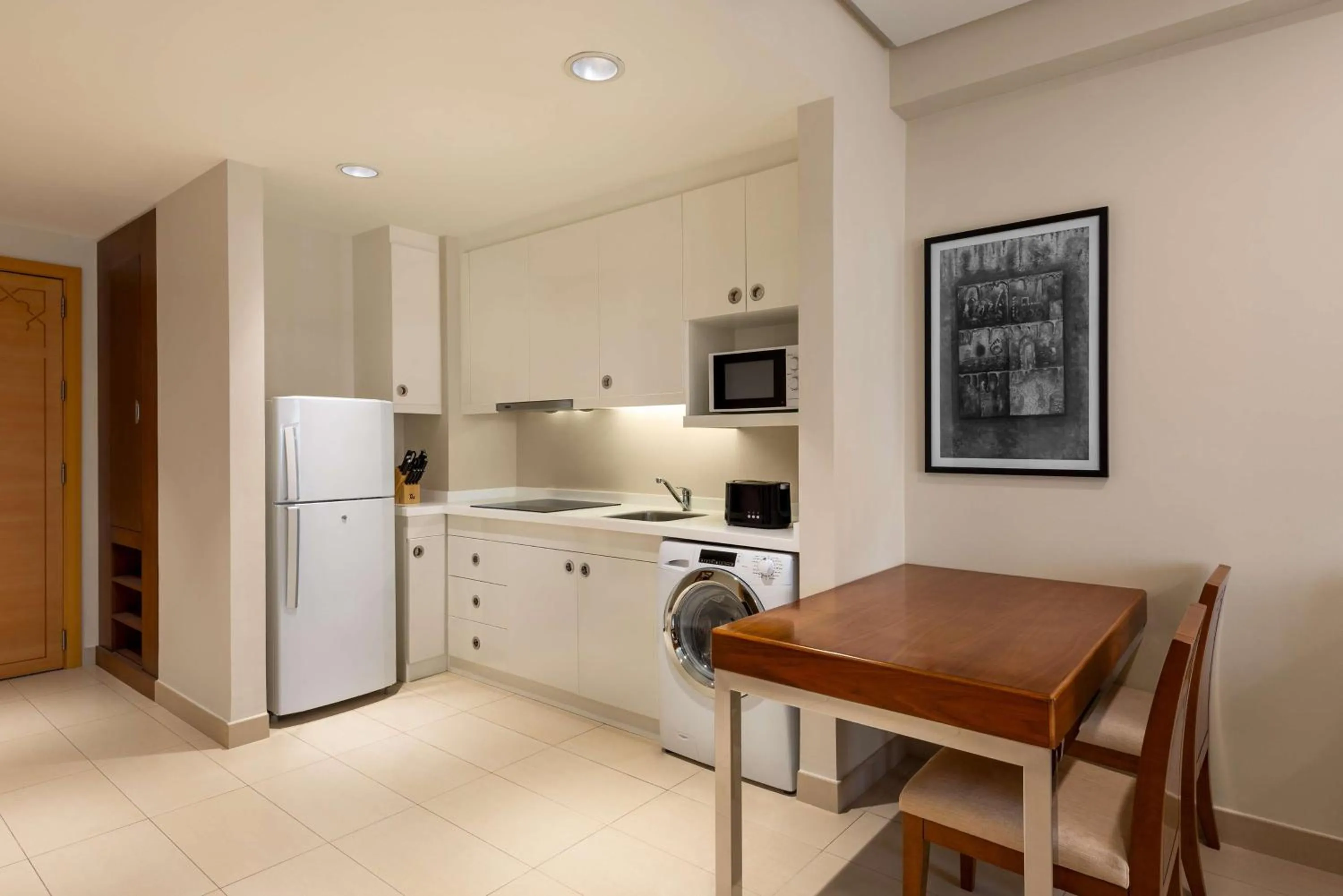 Kitchen or kitchenette in Levatio Suites Muscat, a member of Radisson Individuals
