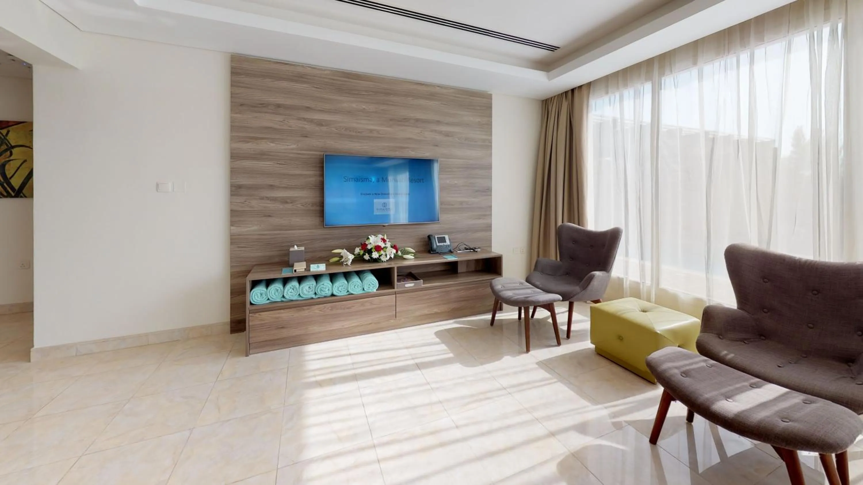 Communal lounge/ TV room in Simaisma A Murwab Resort