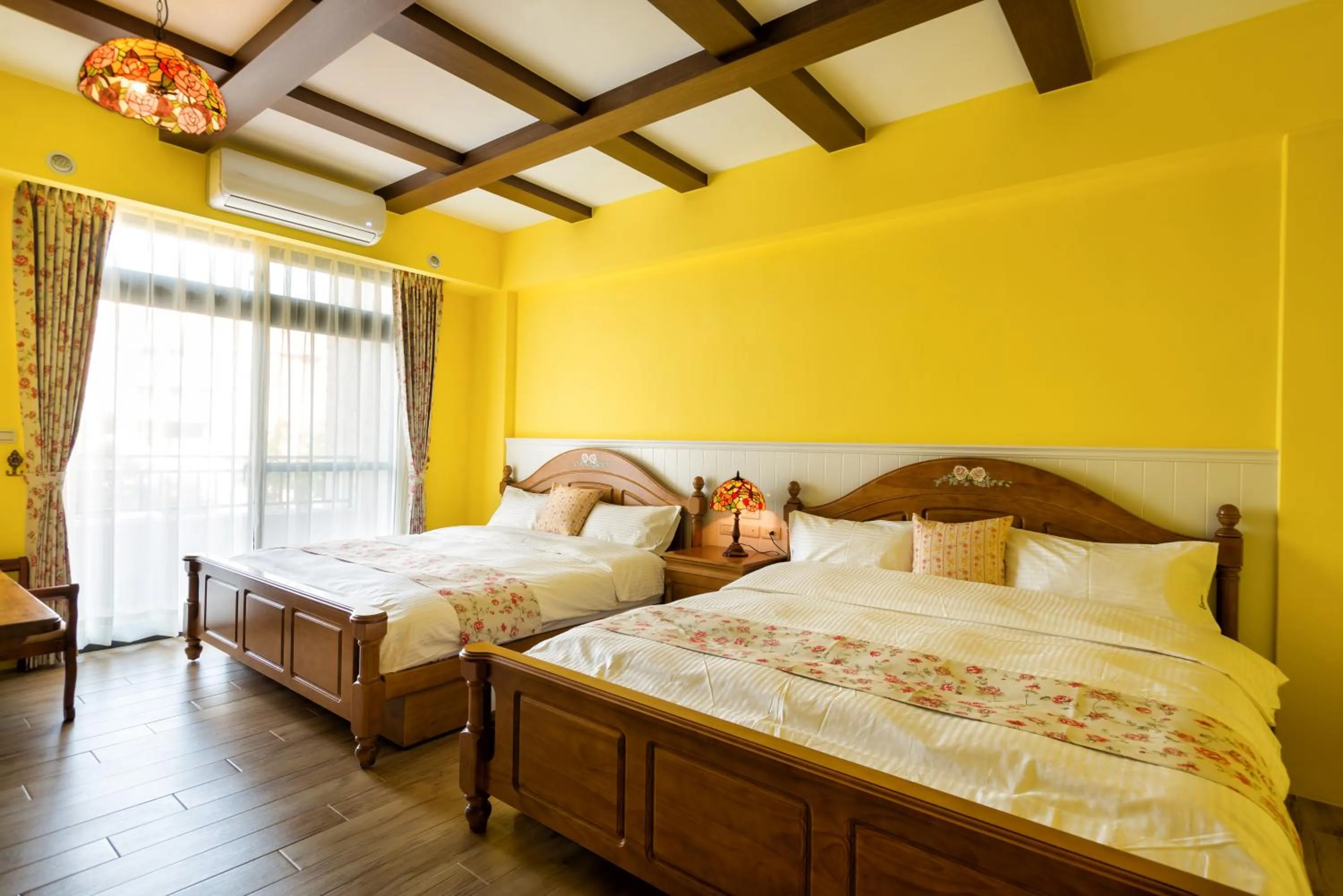 Photo of the whole room, Bed in 伊笛幔休閒民宿 電梯民宿 車位需預約