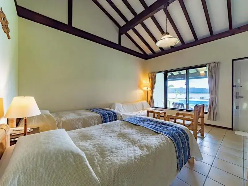 Twin Room with Extra Bed - single occupancy in Villa Unarizaki Twin Room with Extra Bed - single occupancy in Villa Unarizaki