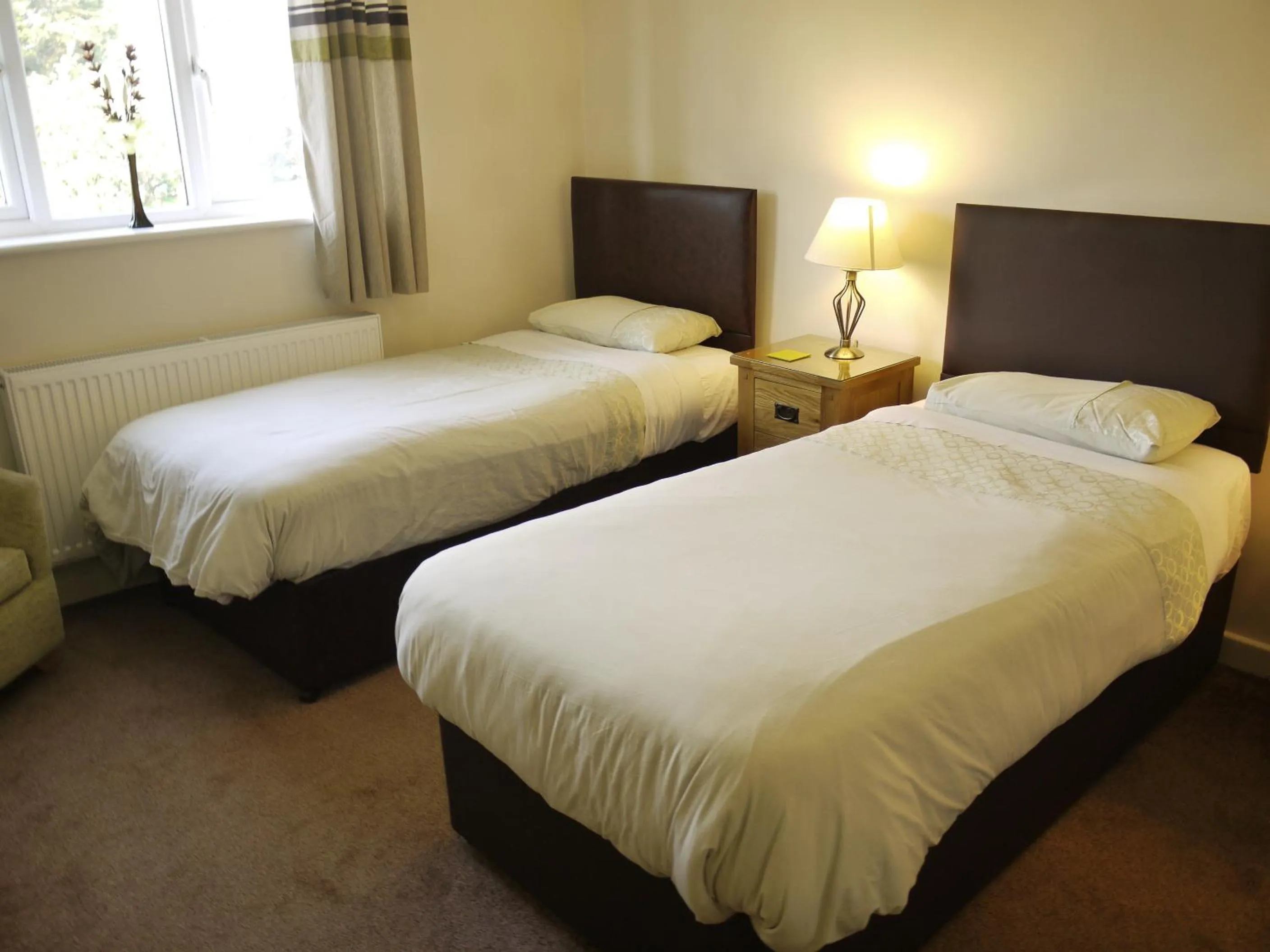 Bed in The New Inn Hotel