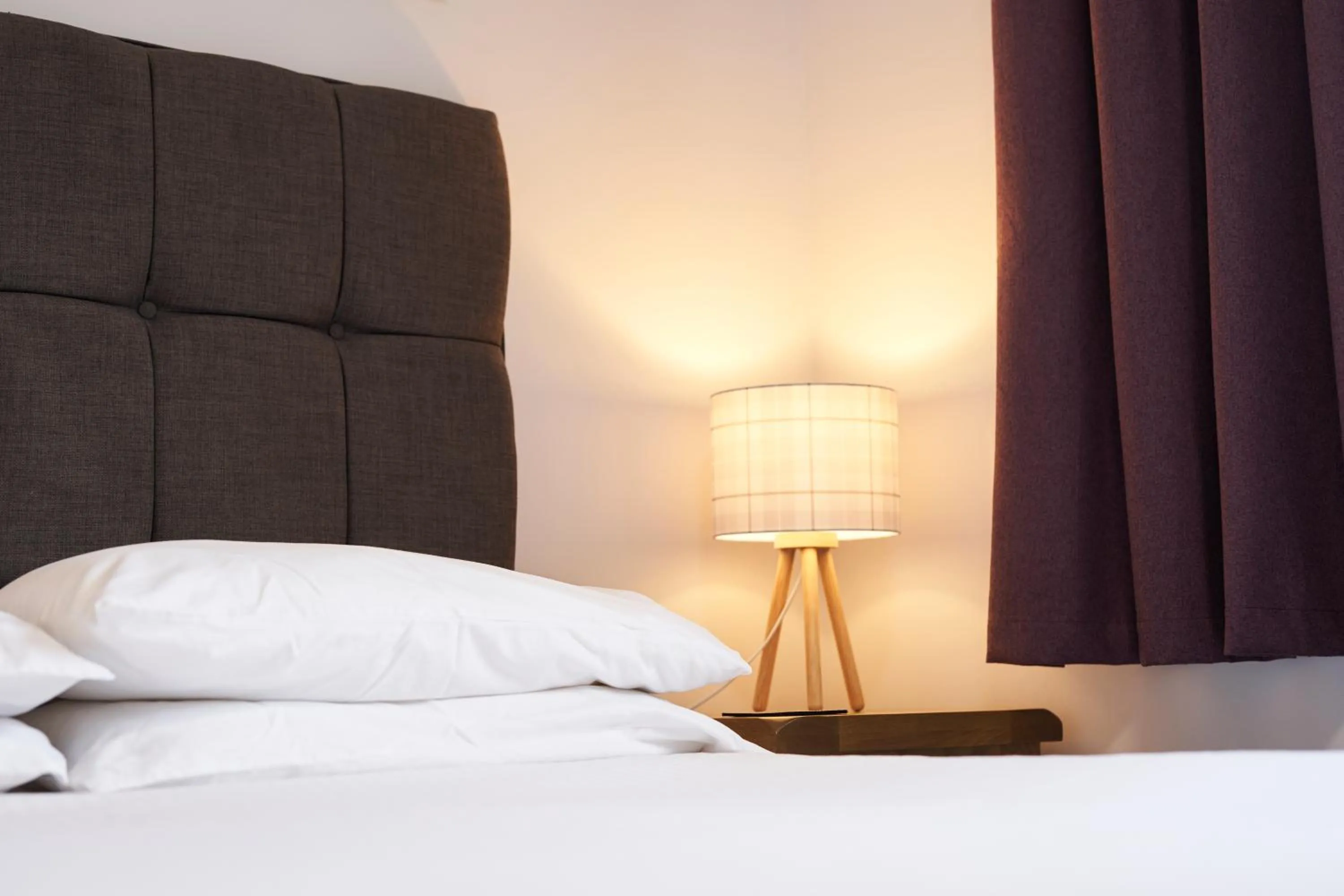 Bed in The New Inn Hotel