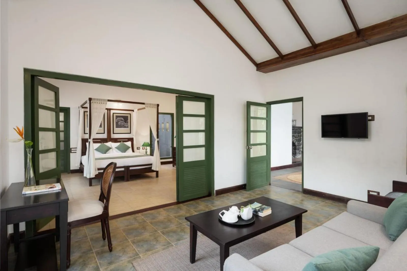 Living room, Bed in Reen Resorts Aanavilasam Plantation Thekkady