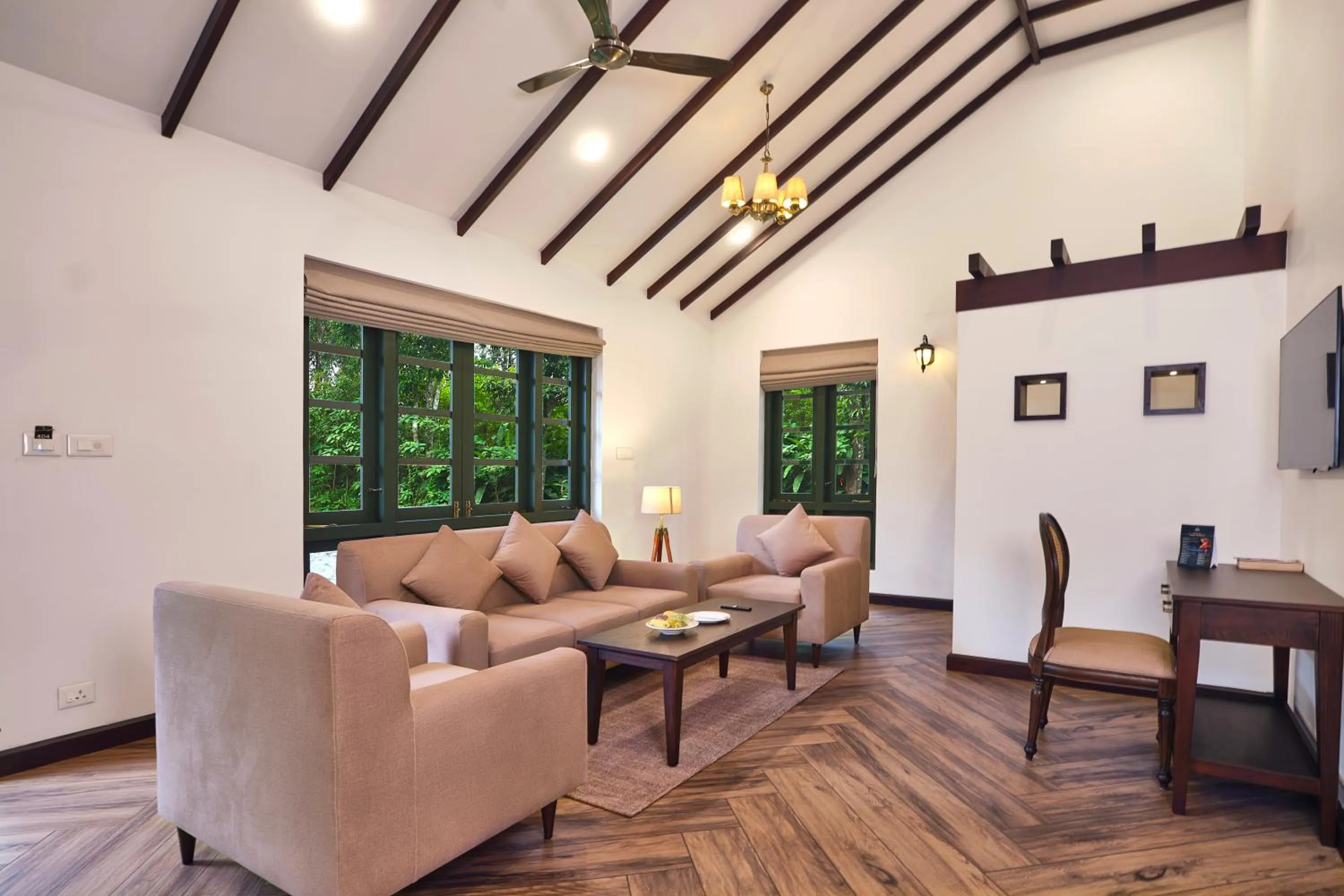 Living room in Reen Resorts Aanavilasam Plantation Thekkady