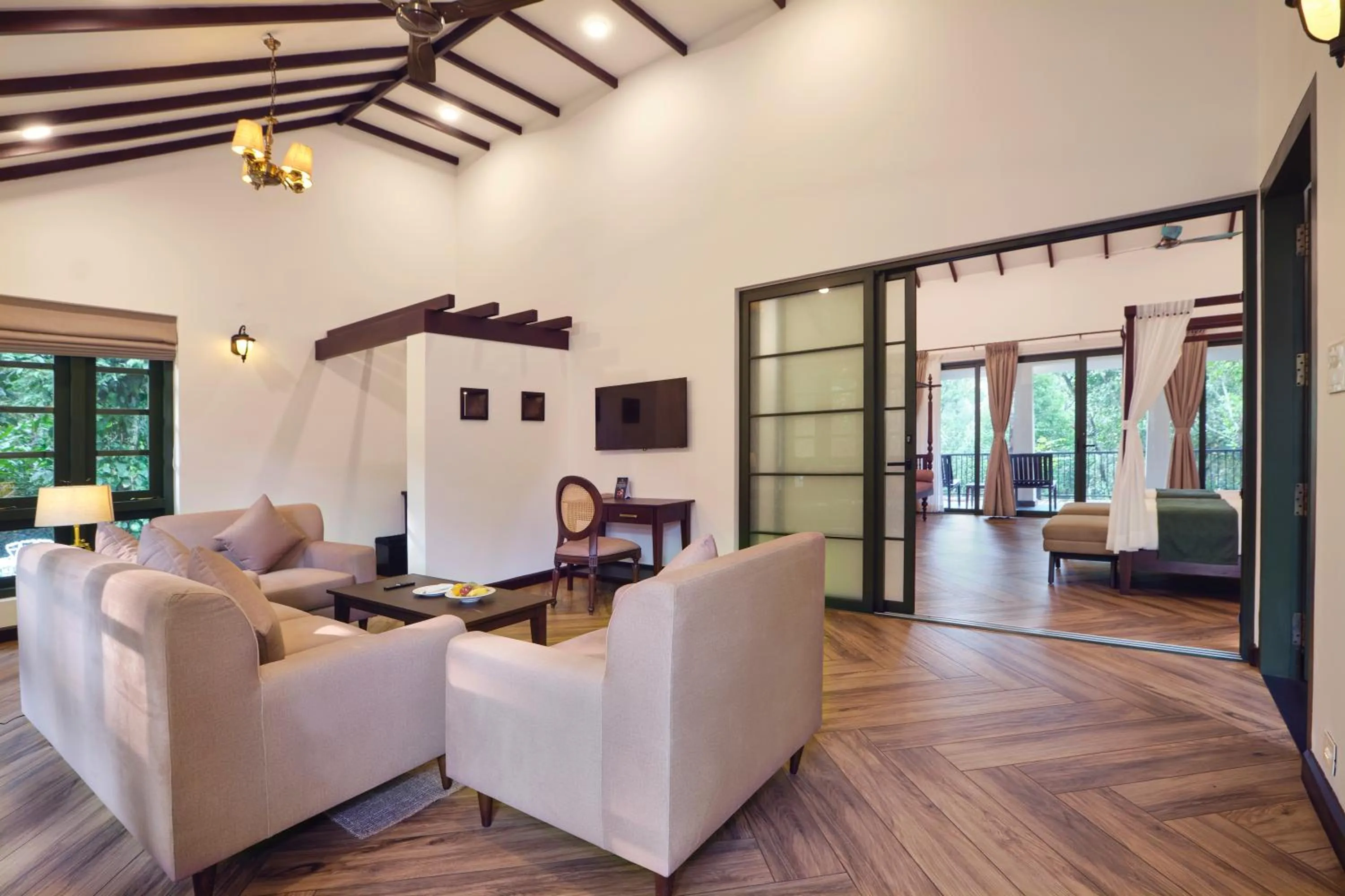 Communal lounge/ TV room in Reen Resorts Aanavilasam Plantation Thekkady