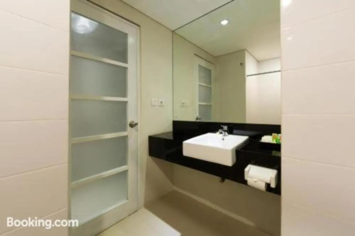 Bathroom in The Rinaya Canggu by ecommerceloka