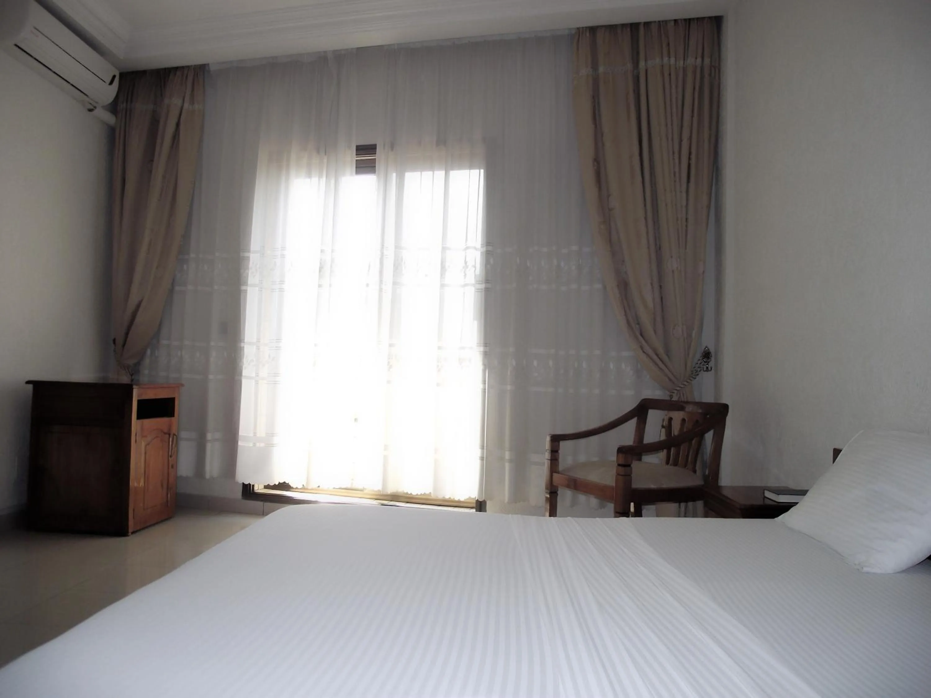 Bed in Hotel Ghis Palace