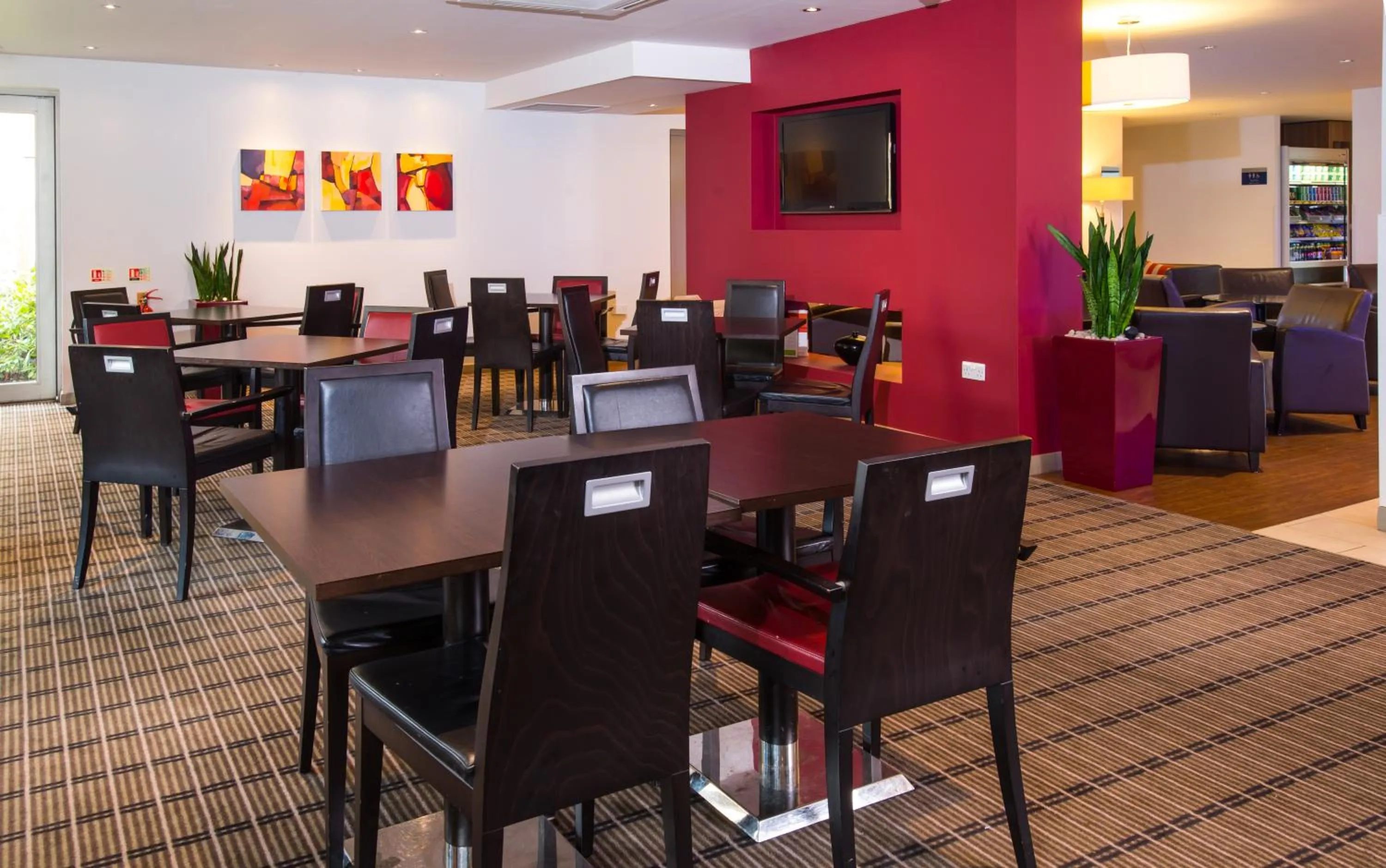 Lounge or bar in Holiday Inn Express East Midlands Airport by IHG