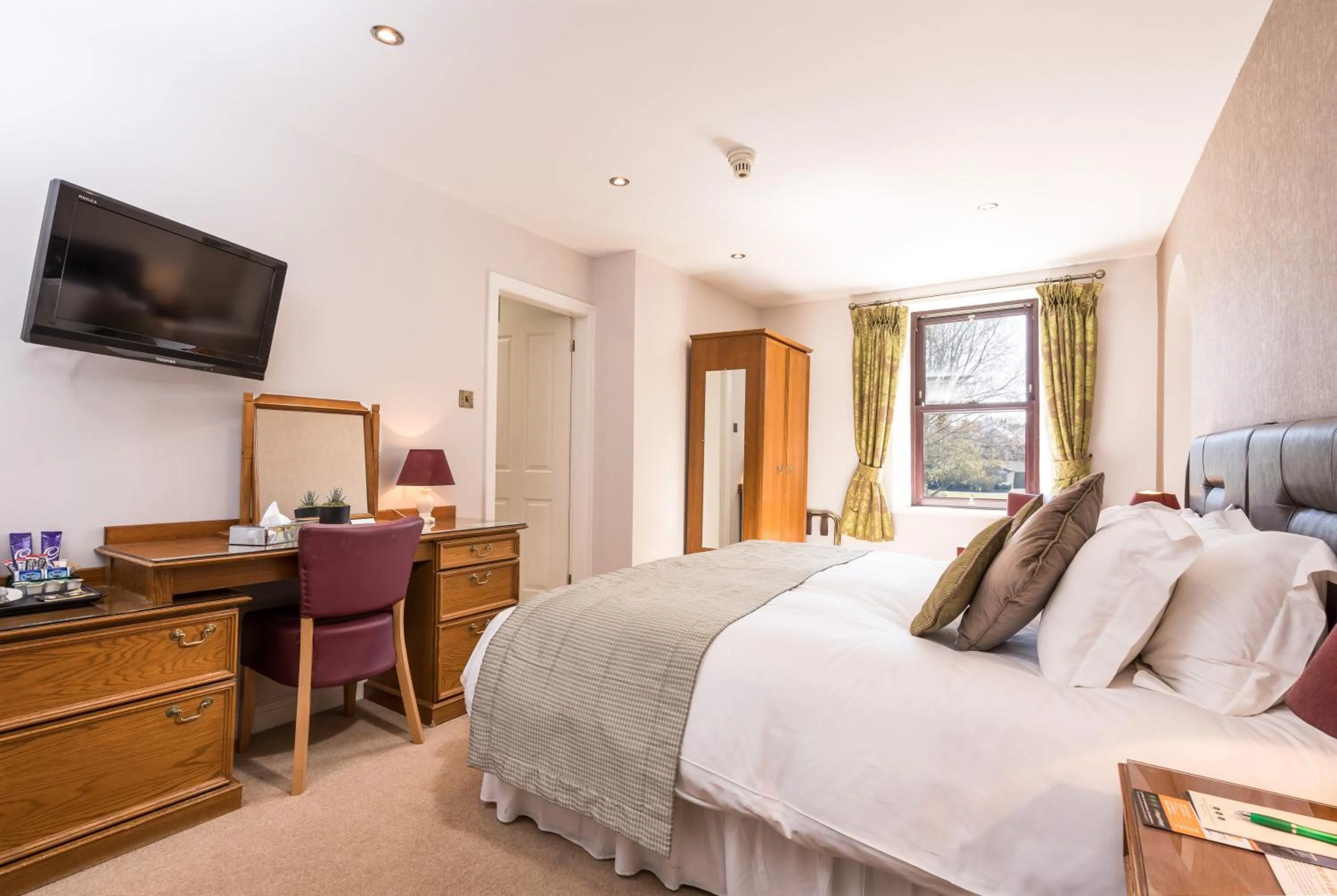 Bed in Le Friquet Hotel