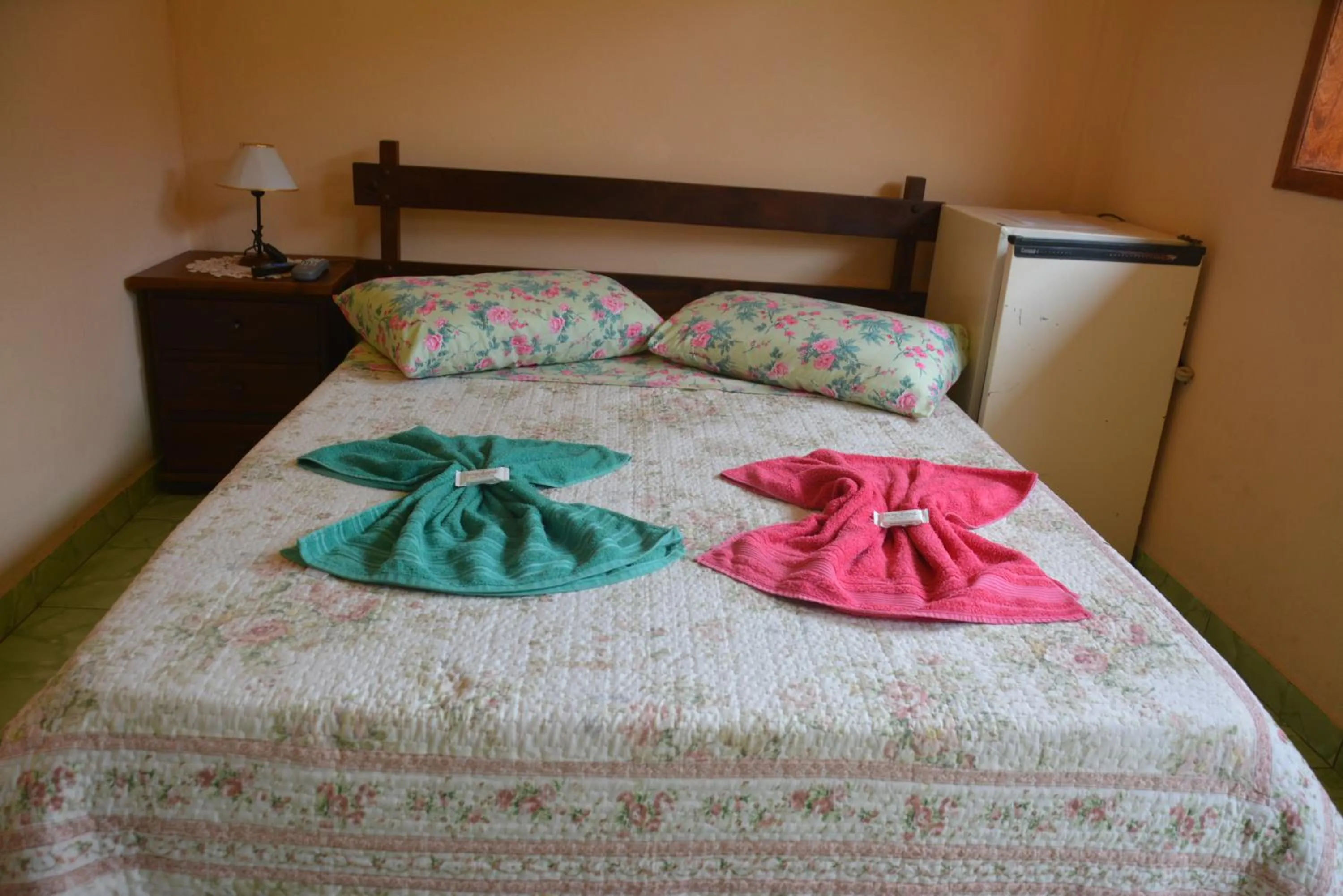 Bed in Sítio e Pousada Recanto Dos Ipês