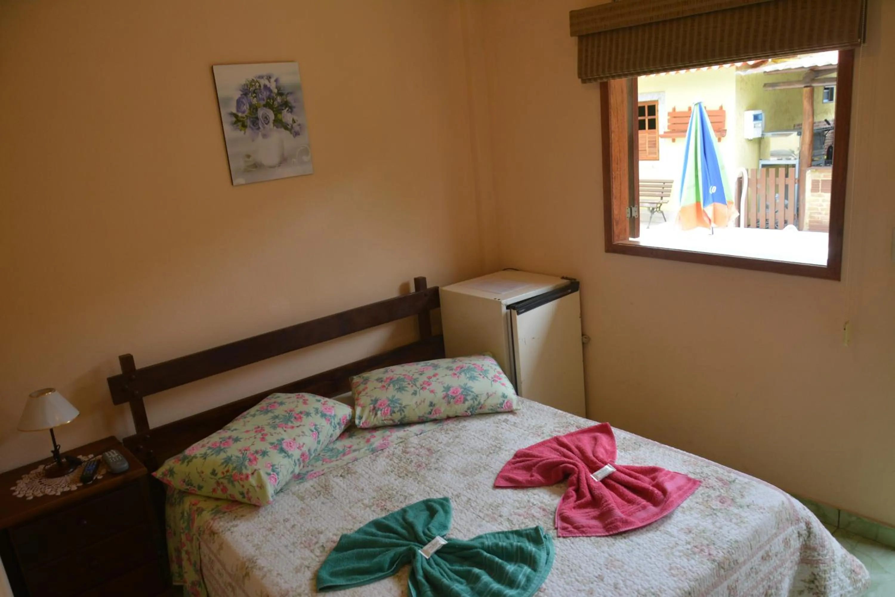 Bed in Sítio e Pousada Recanto Dos Ipês