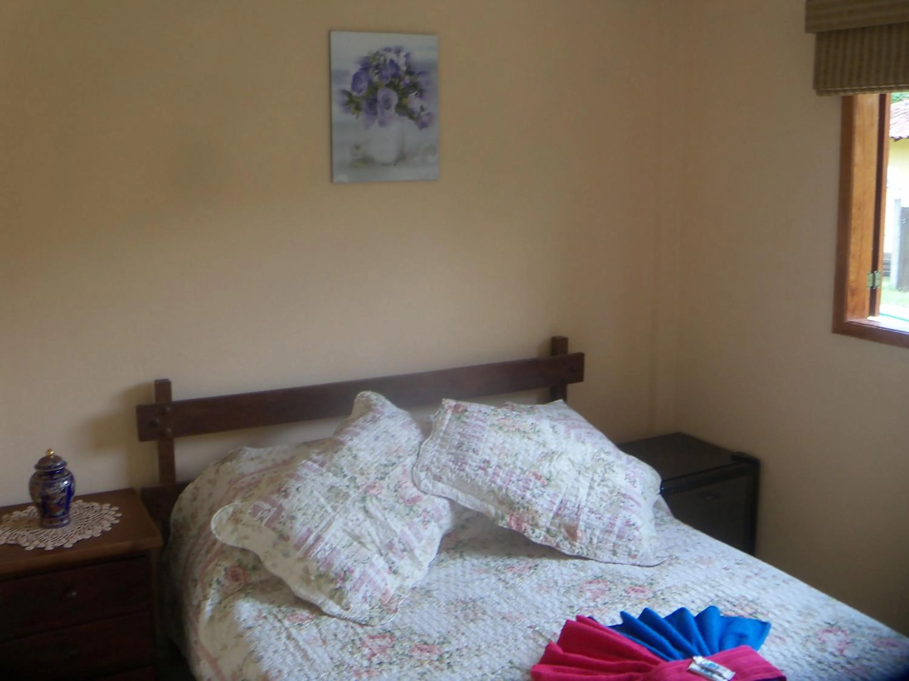 Bed in Sítio e Pousada Recanto Dos Ipês