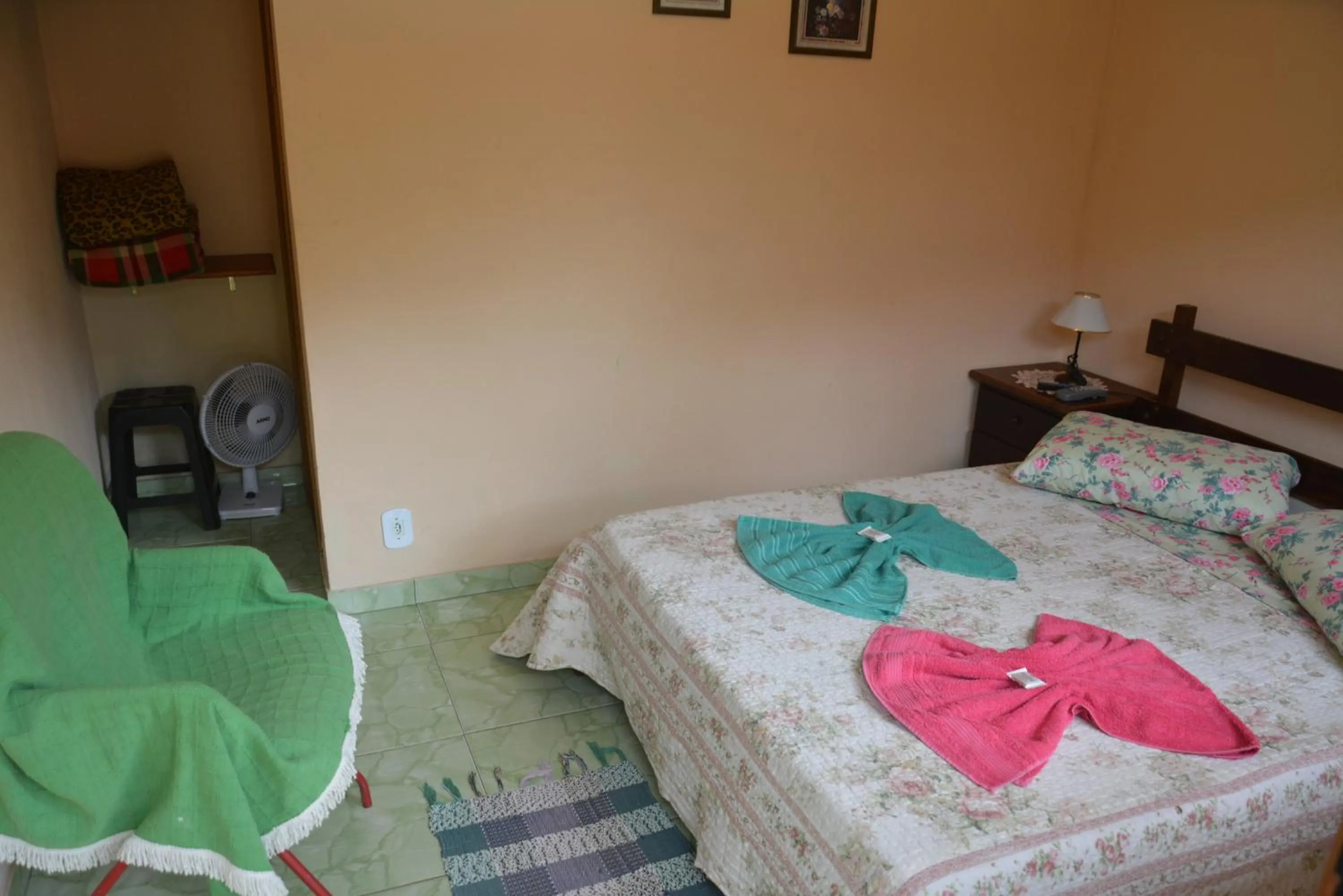 Bed in Sítio e Pousada Recanto Dos Ipês