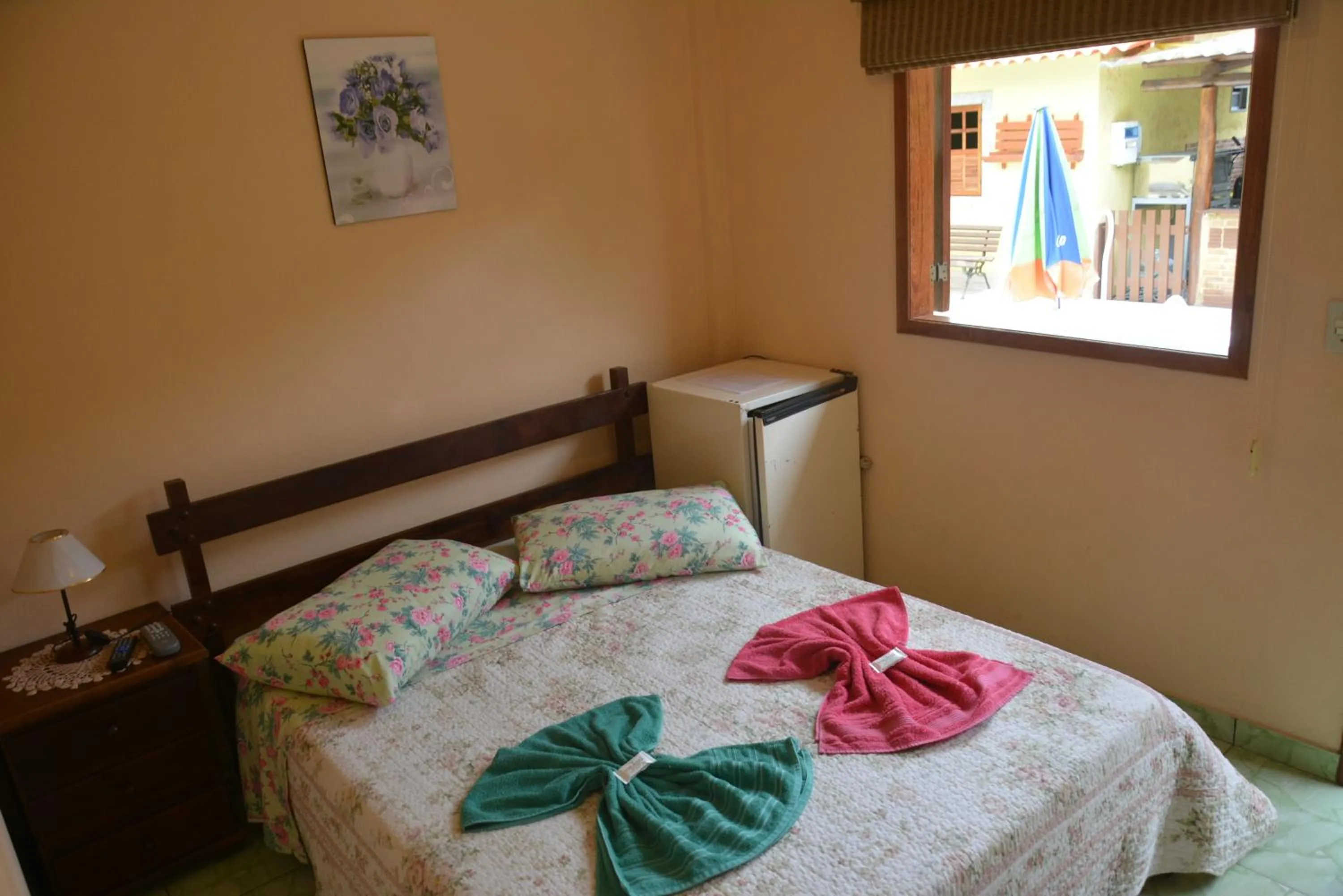 Bed in Sítio e Pousada Recanto Dos Ipês