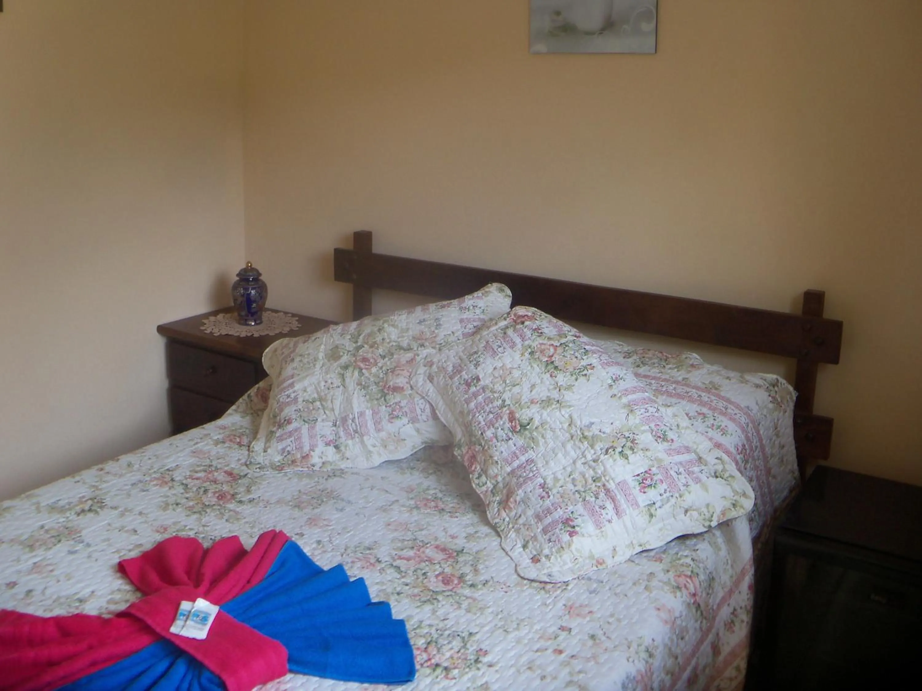 Bed in Sítio e Pousada Recanto Dos Ipês