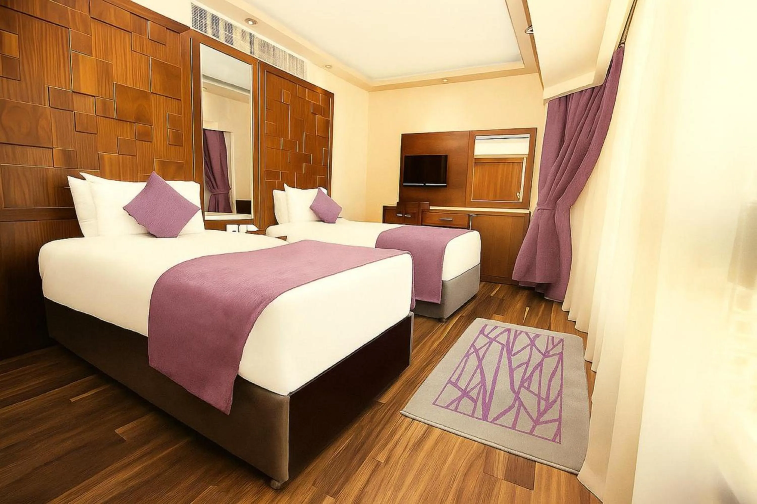 Bed in Pyramisa Suites Hotel Cairo