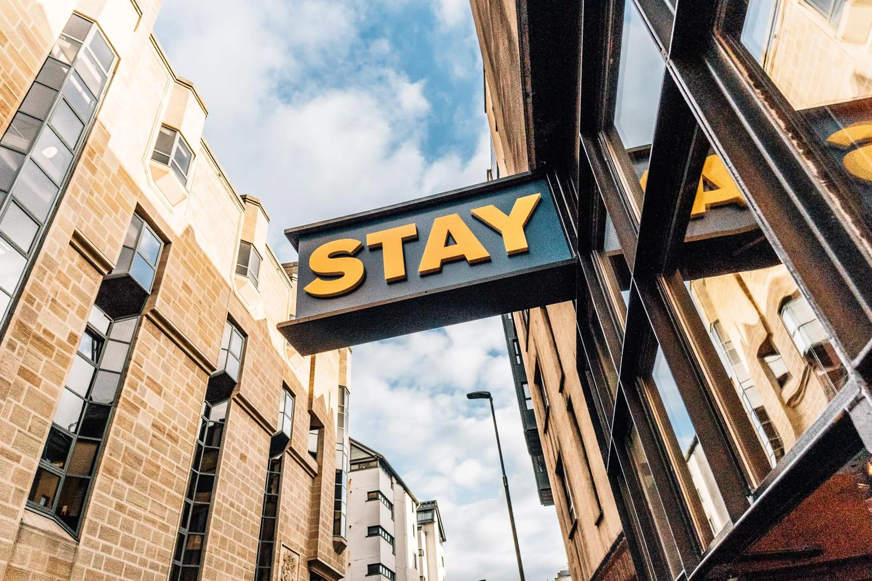 Property logo or sign in Stay Central Hotel