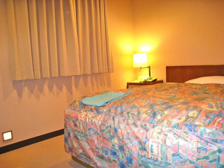 Bed in Hotel Takamatsu Hills