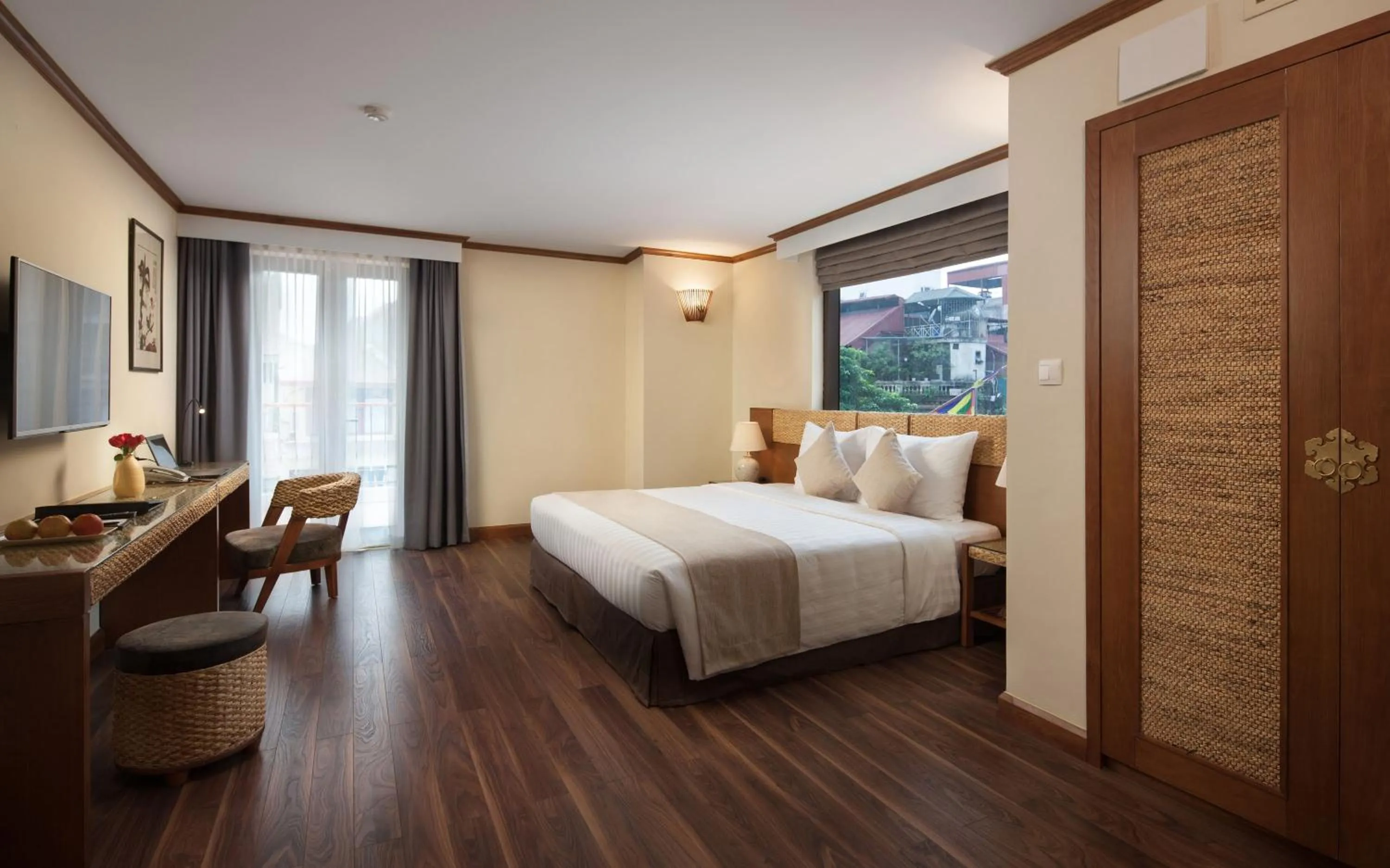 Bed in MK Premier Boutique Hotel