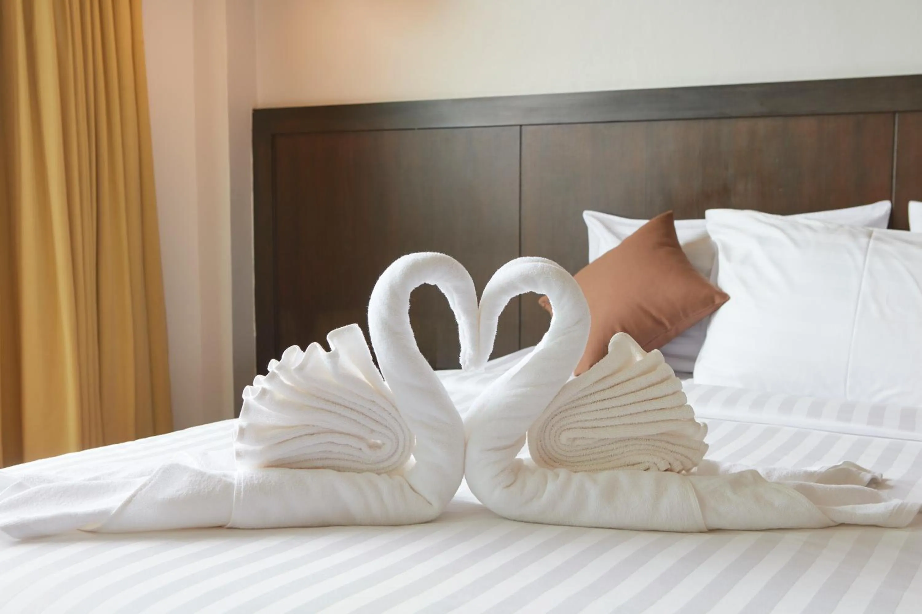 Bed in Rhienchai Place Hotel