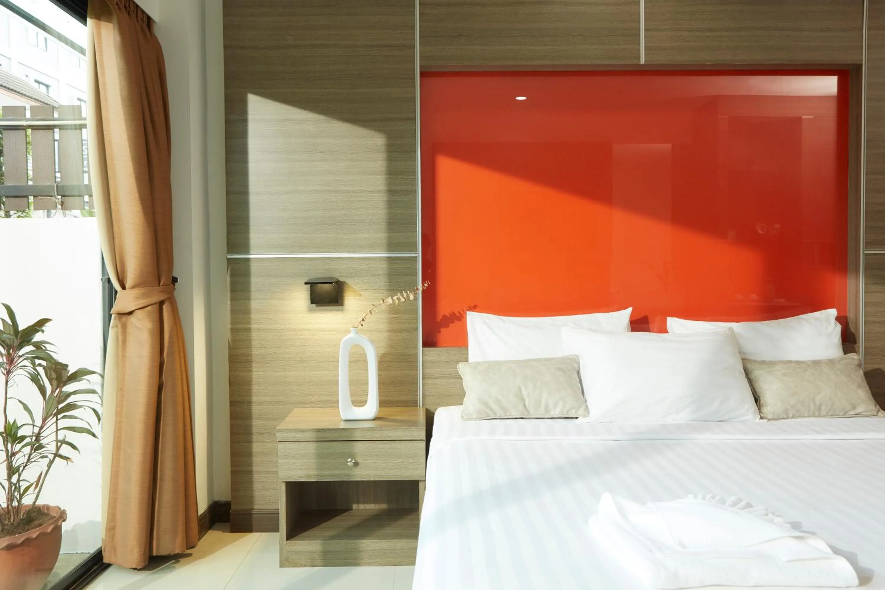 Bed in Rhienchai Place Hotel