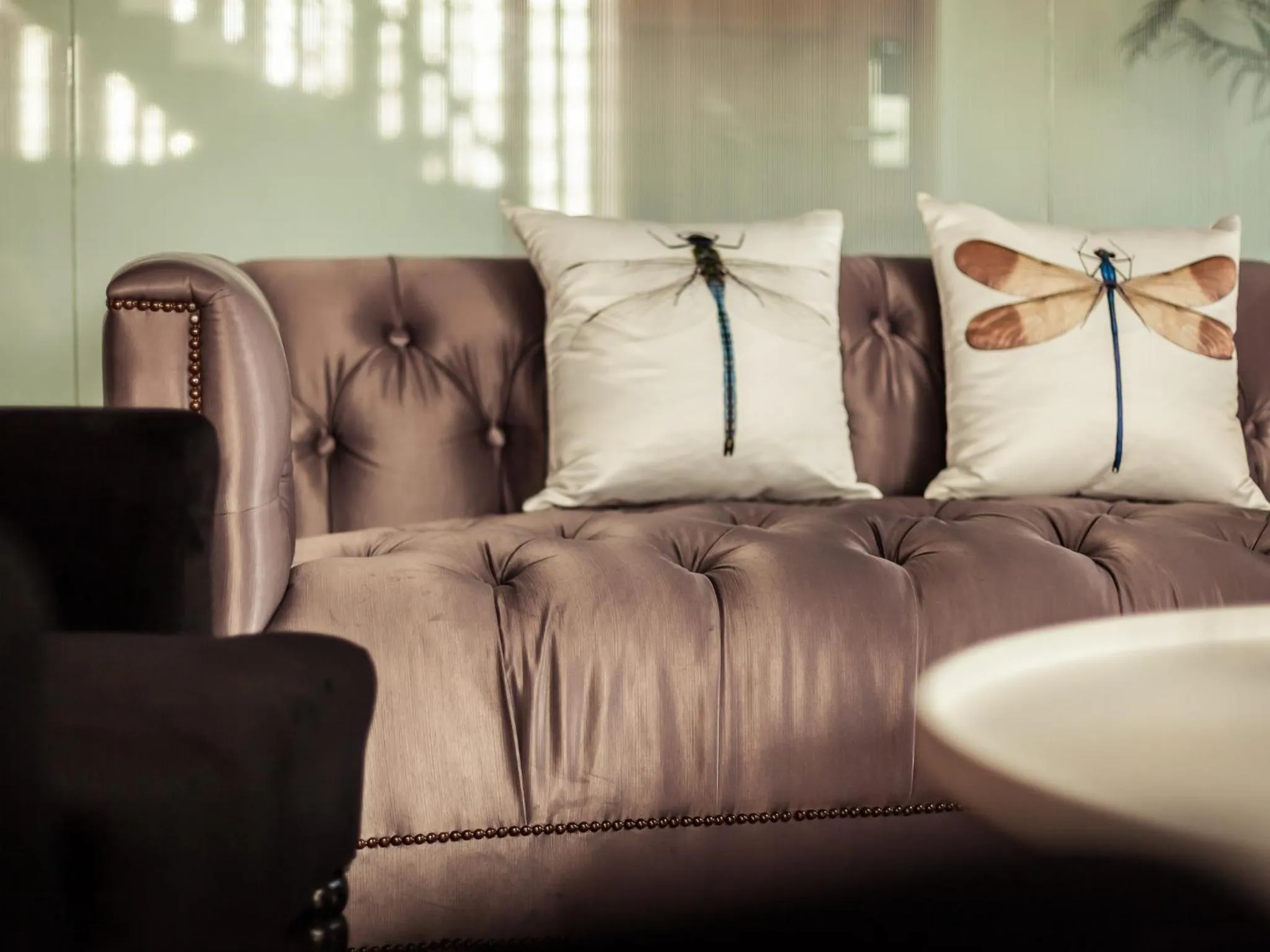 Communal lounge/ TV room in Metro Pratunam Boutique Hotel