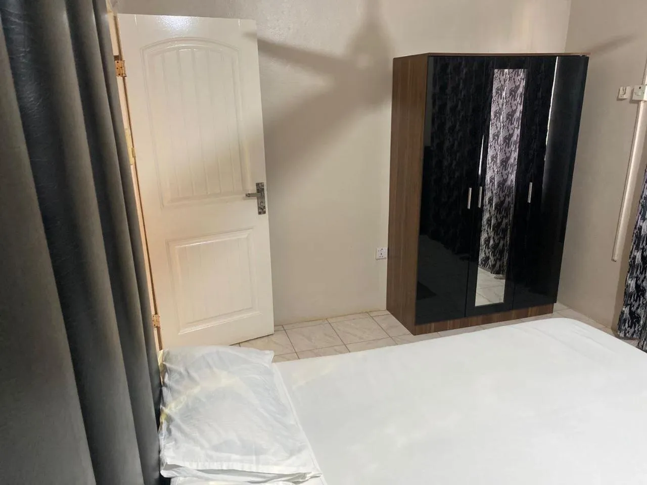 Bedroom, Bed in Harmony house apartments