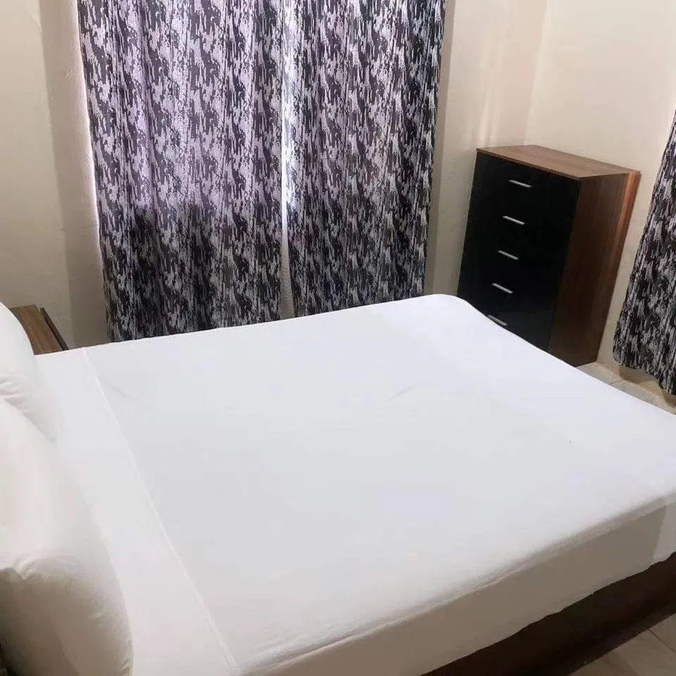 Bedroom, Bed in Harmony house apartments