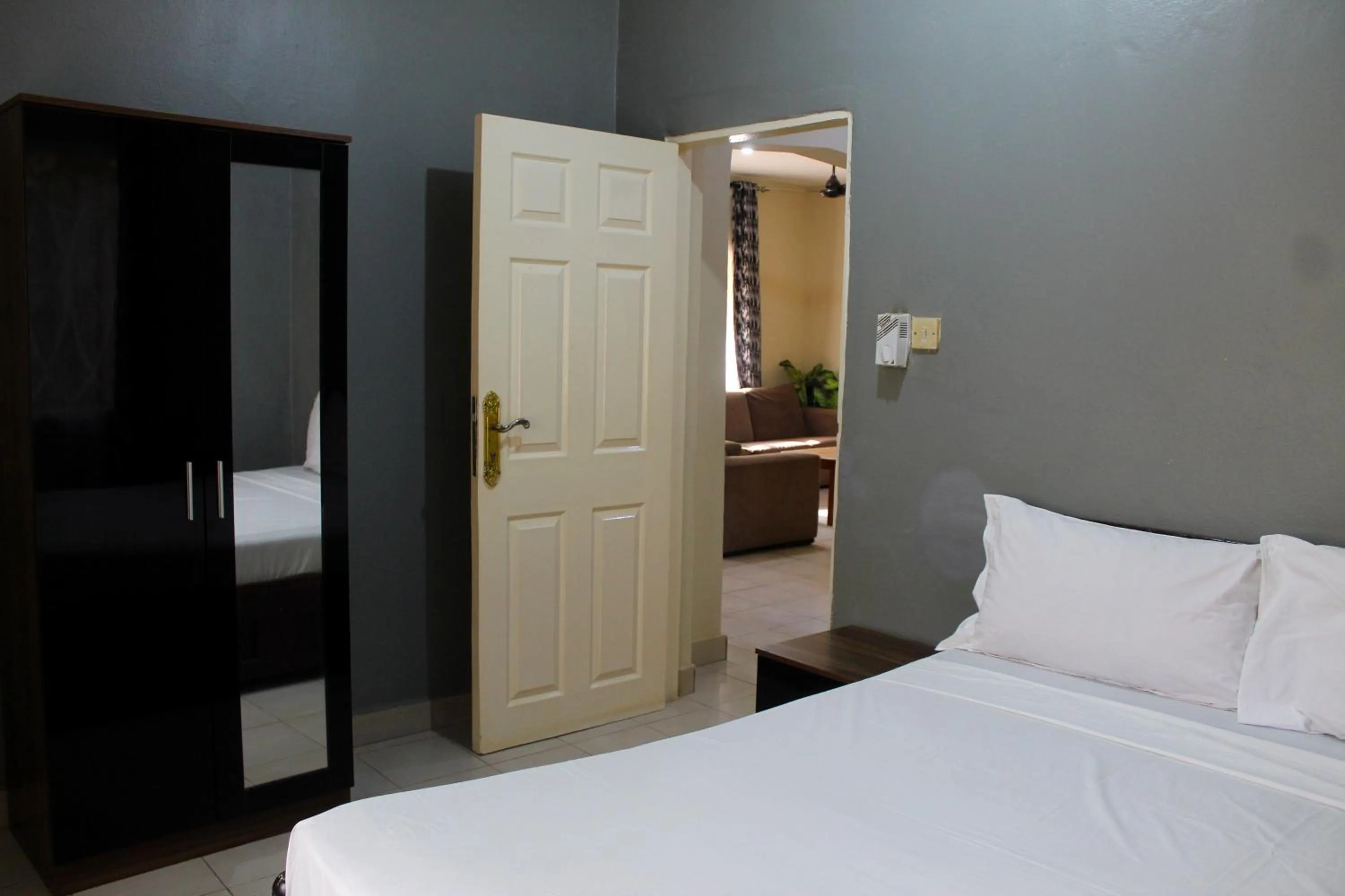 Bedroom, Bed in Harmony house apartments