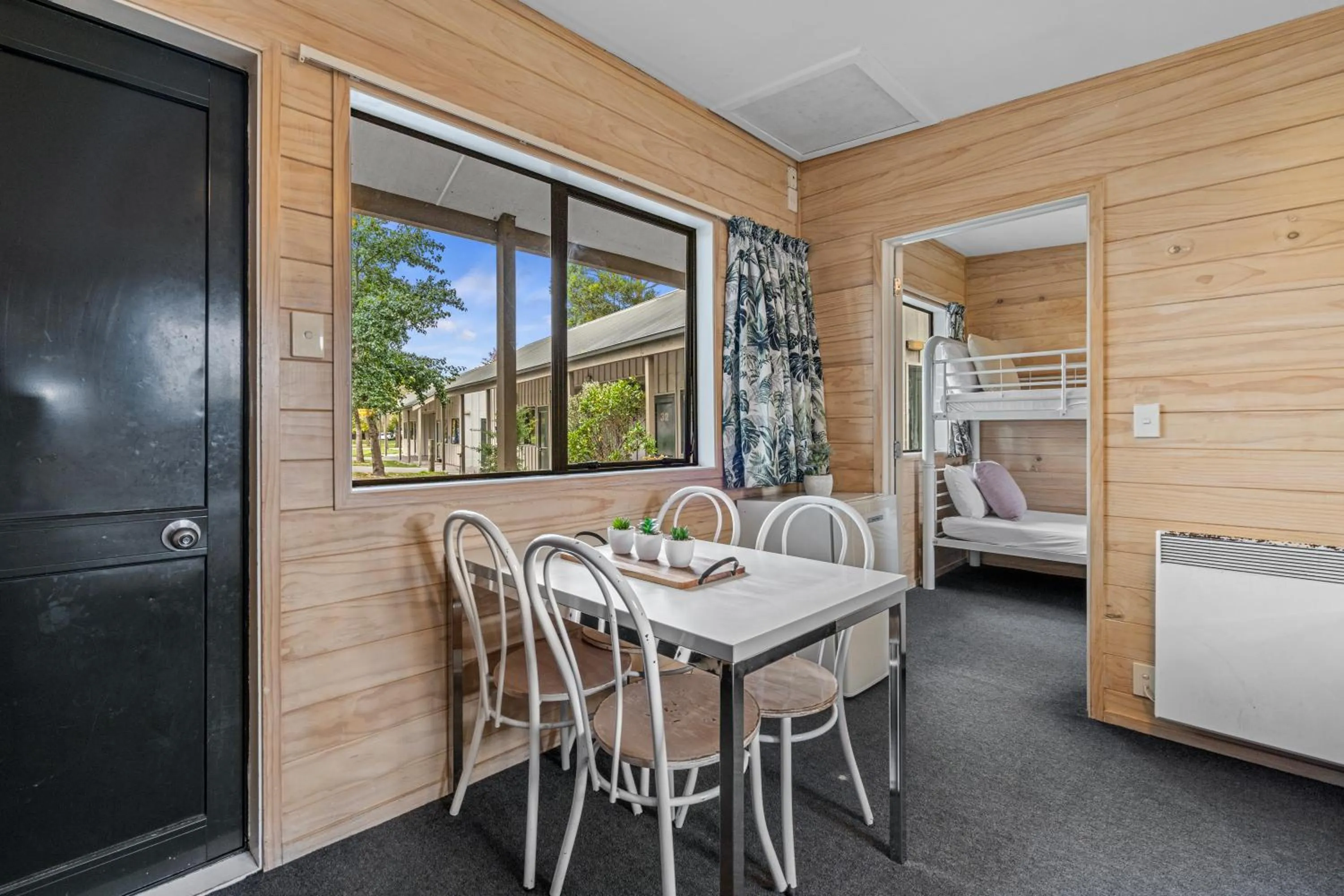 Seating area, Bed in Tasman Holiday Parks - Christchurch