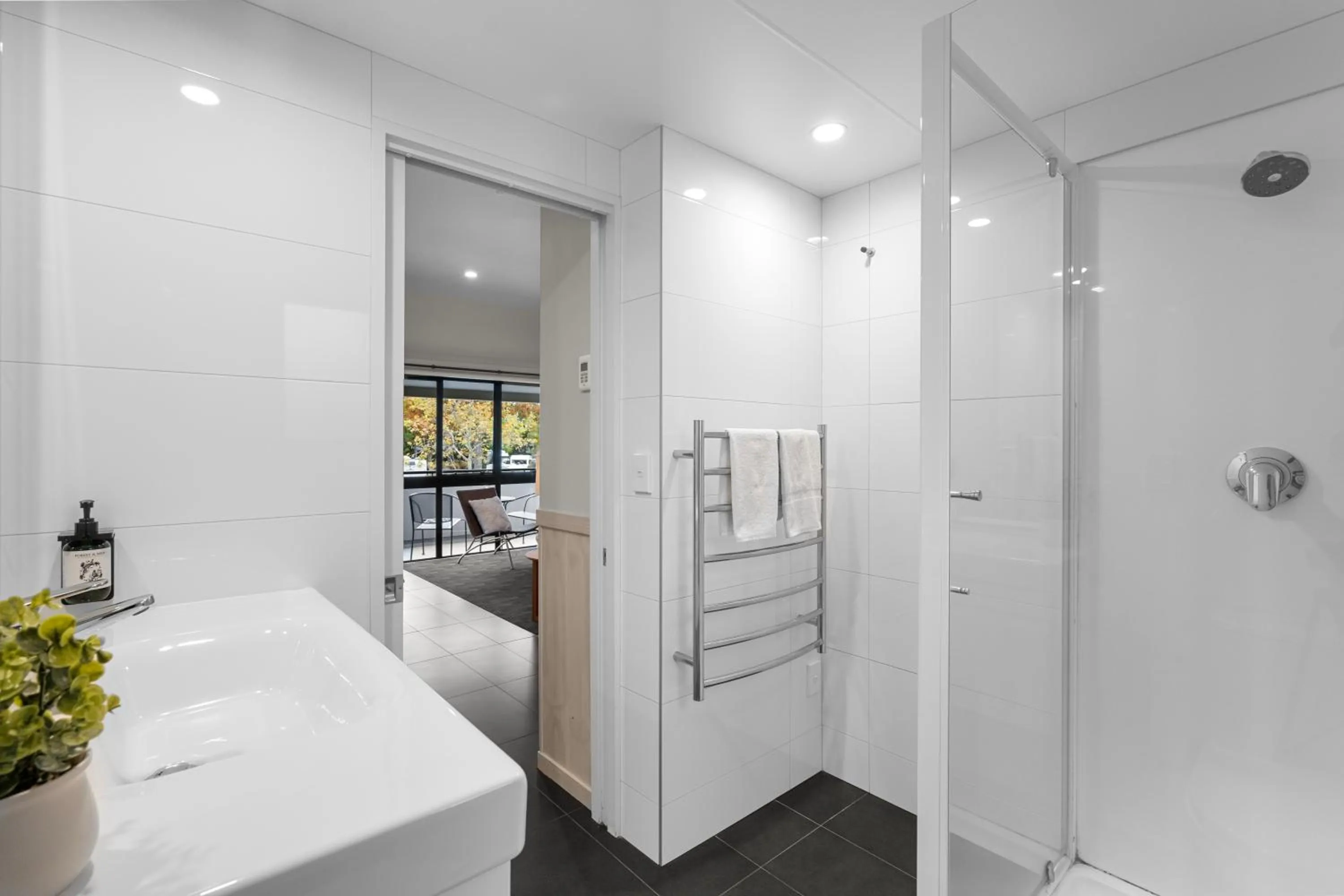 Bathroom, Bed in Tasman Holiday Parks - Christchurch