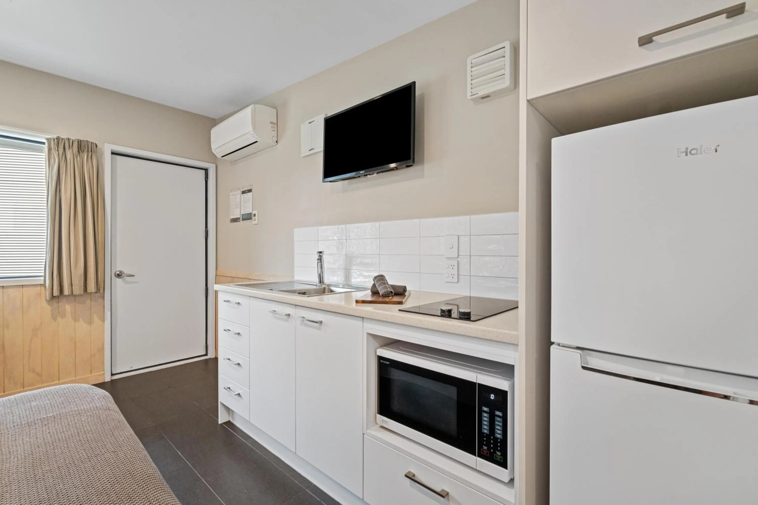 Kitchen or kitchenette in Tasman Holiday Parks - Christchurch