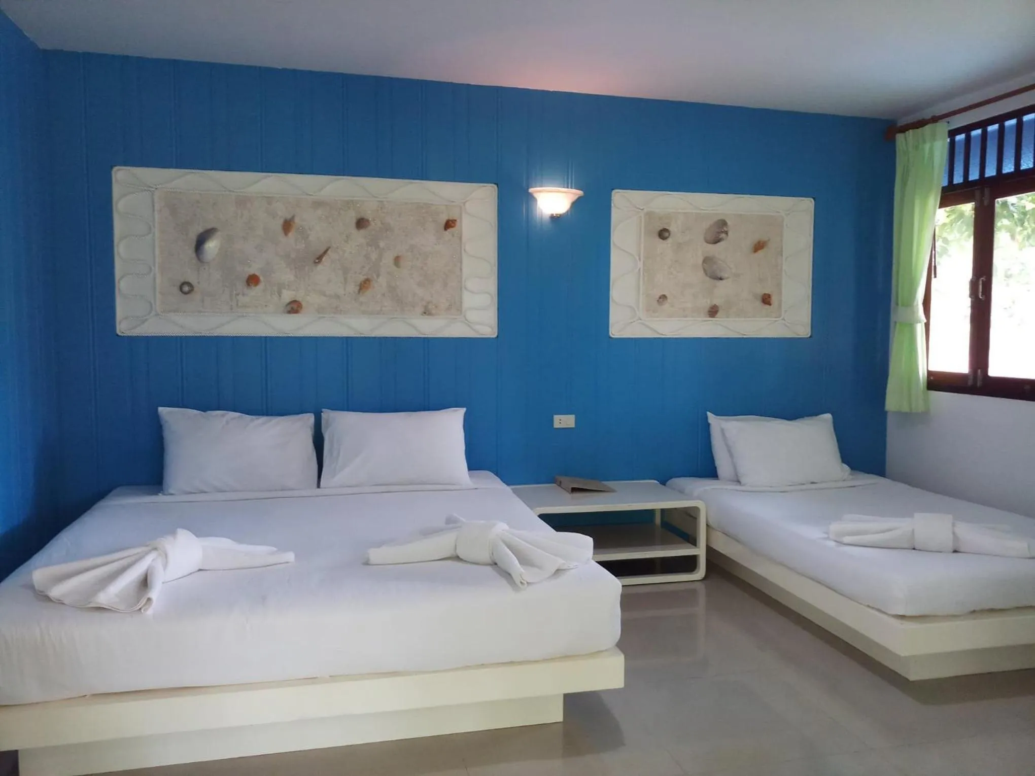 Bed in Baan Talay See Cream Resort