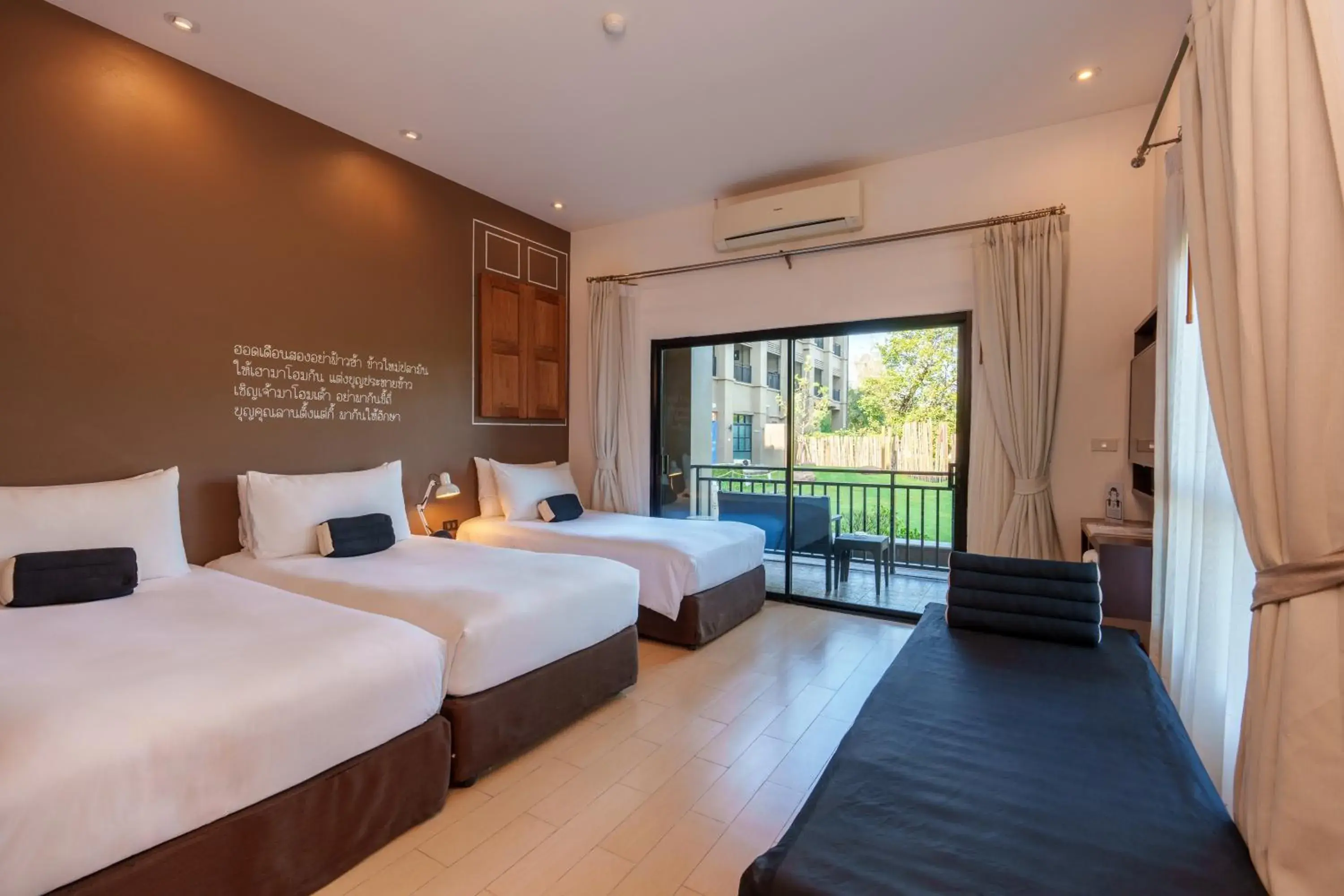 Deluxe Triple Room in Blu Monkey Brown House Udonthani Deluxe Triple Room in Blu Monkey Brown House Udonthani