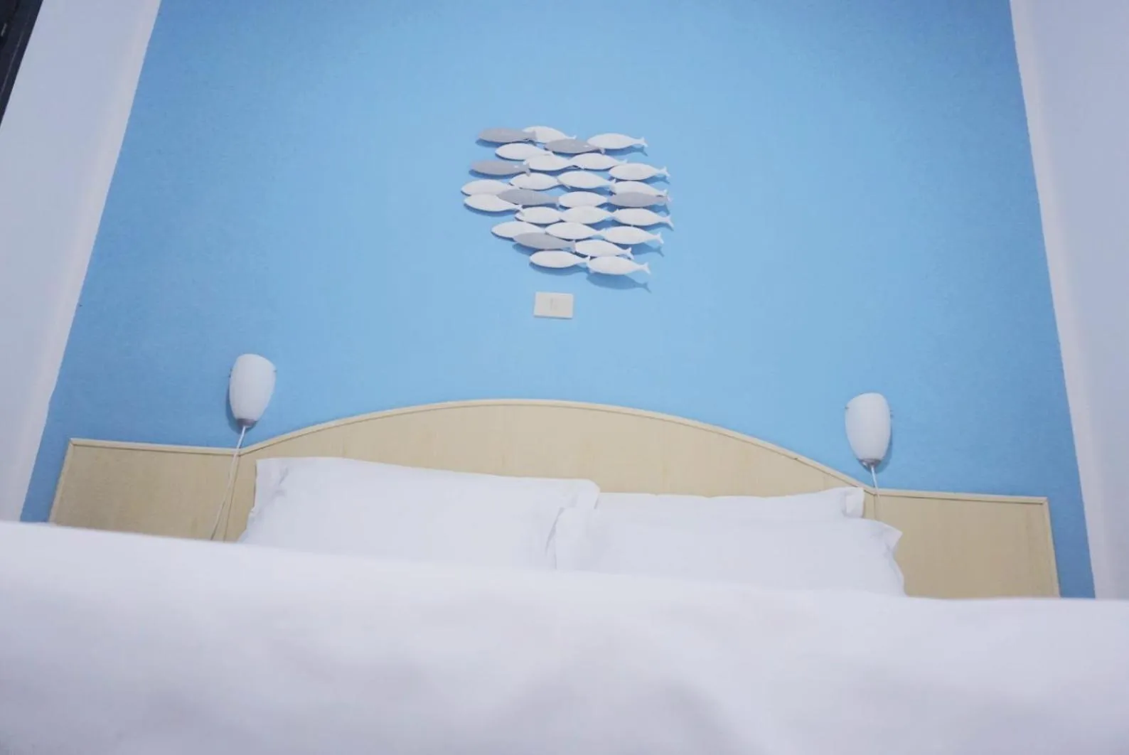 Bed in Hotel Arcobaleno