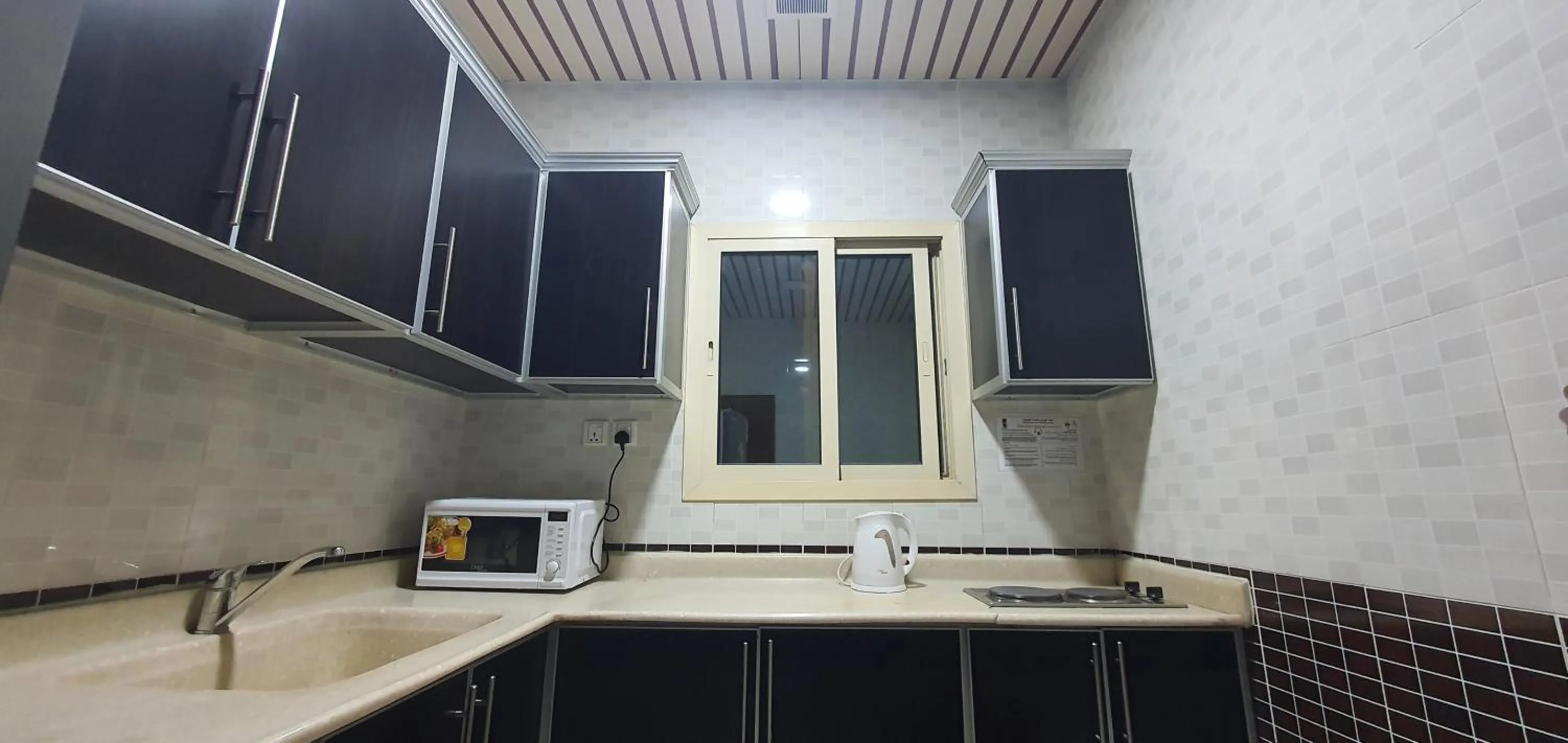 Kitchen or kitchenette in شقق نطوان للشقق المخدومة