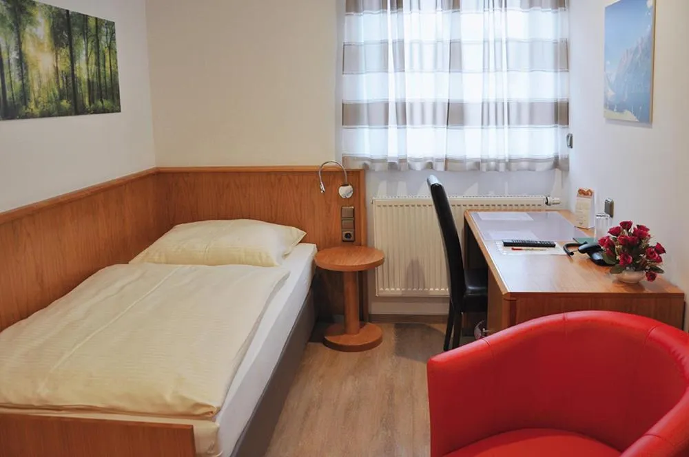 Bed in Garni Hotel Alber