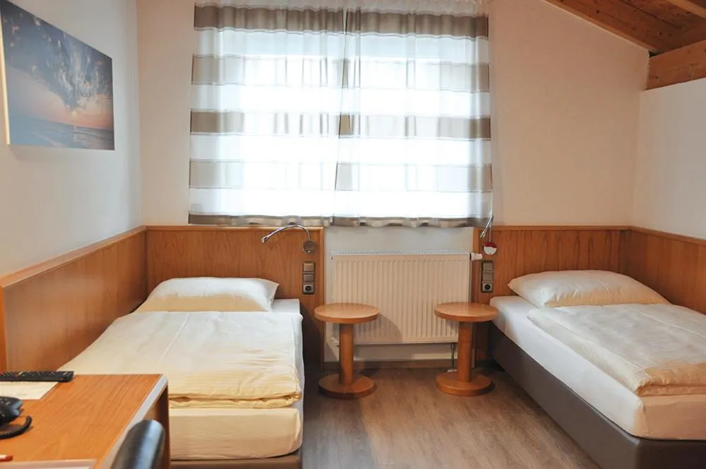 Bed in Garni Hotel Alber