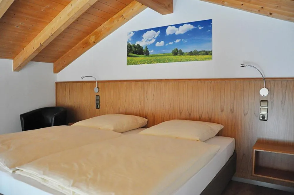 Bed in Garni Hotel Alber