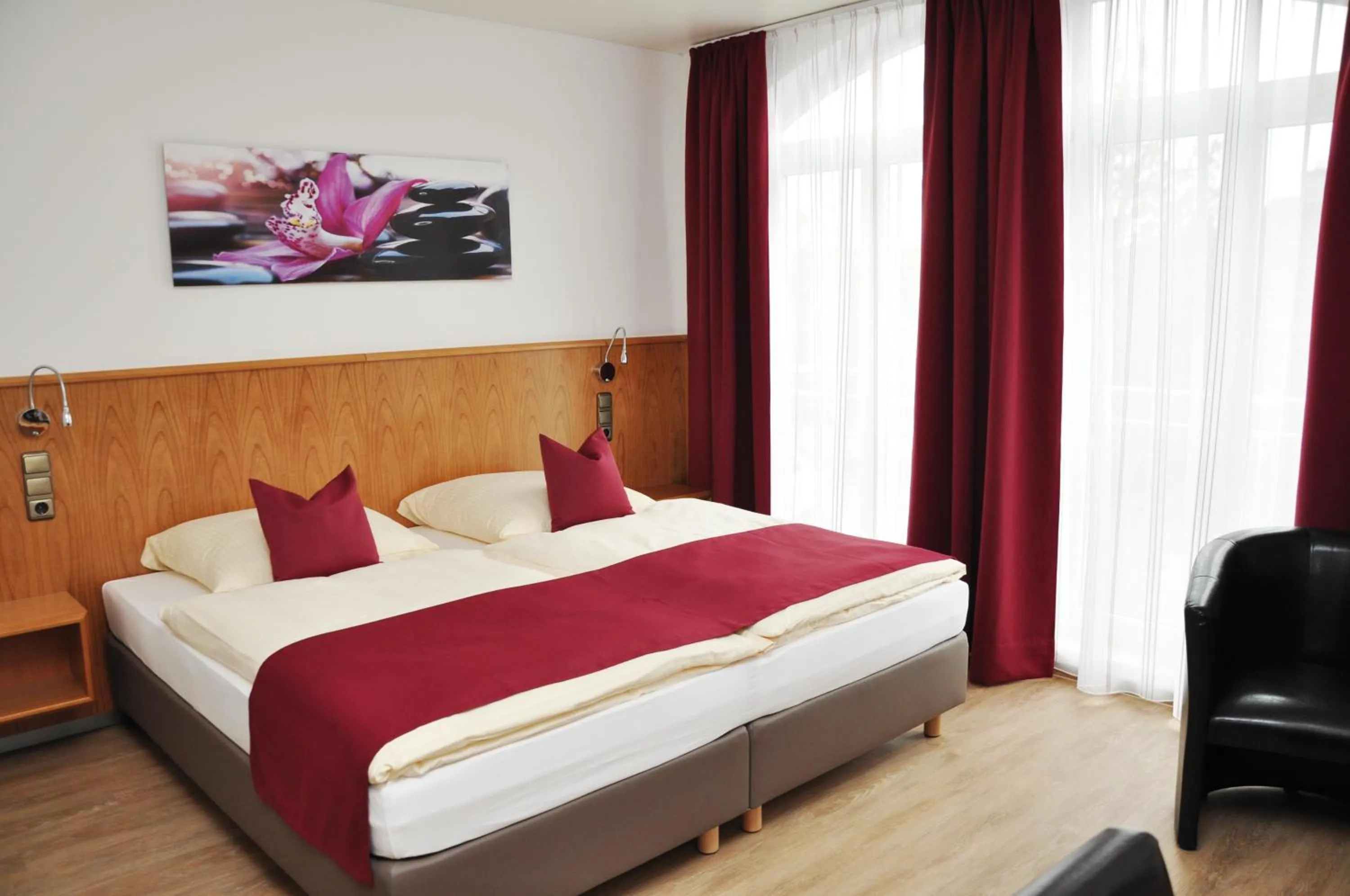 Bed in Garni Hotel Alber