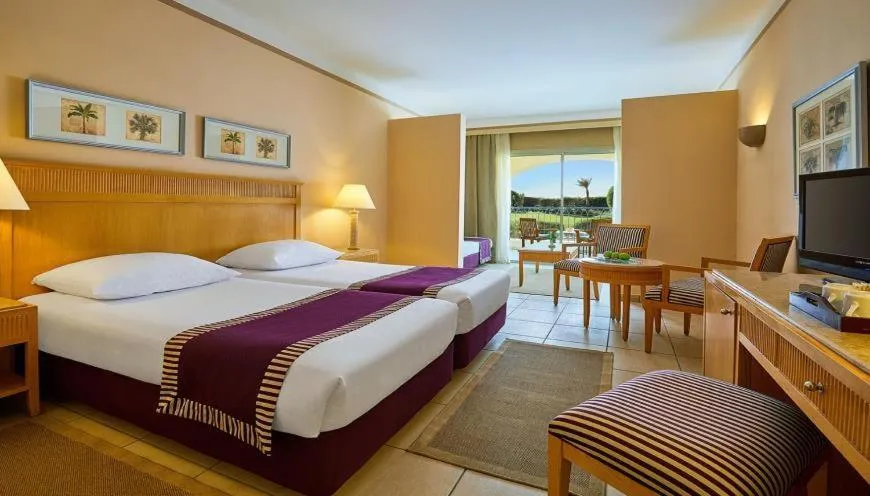 Photo of the whole room, Bed in JAZ Makadi Star & Spa