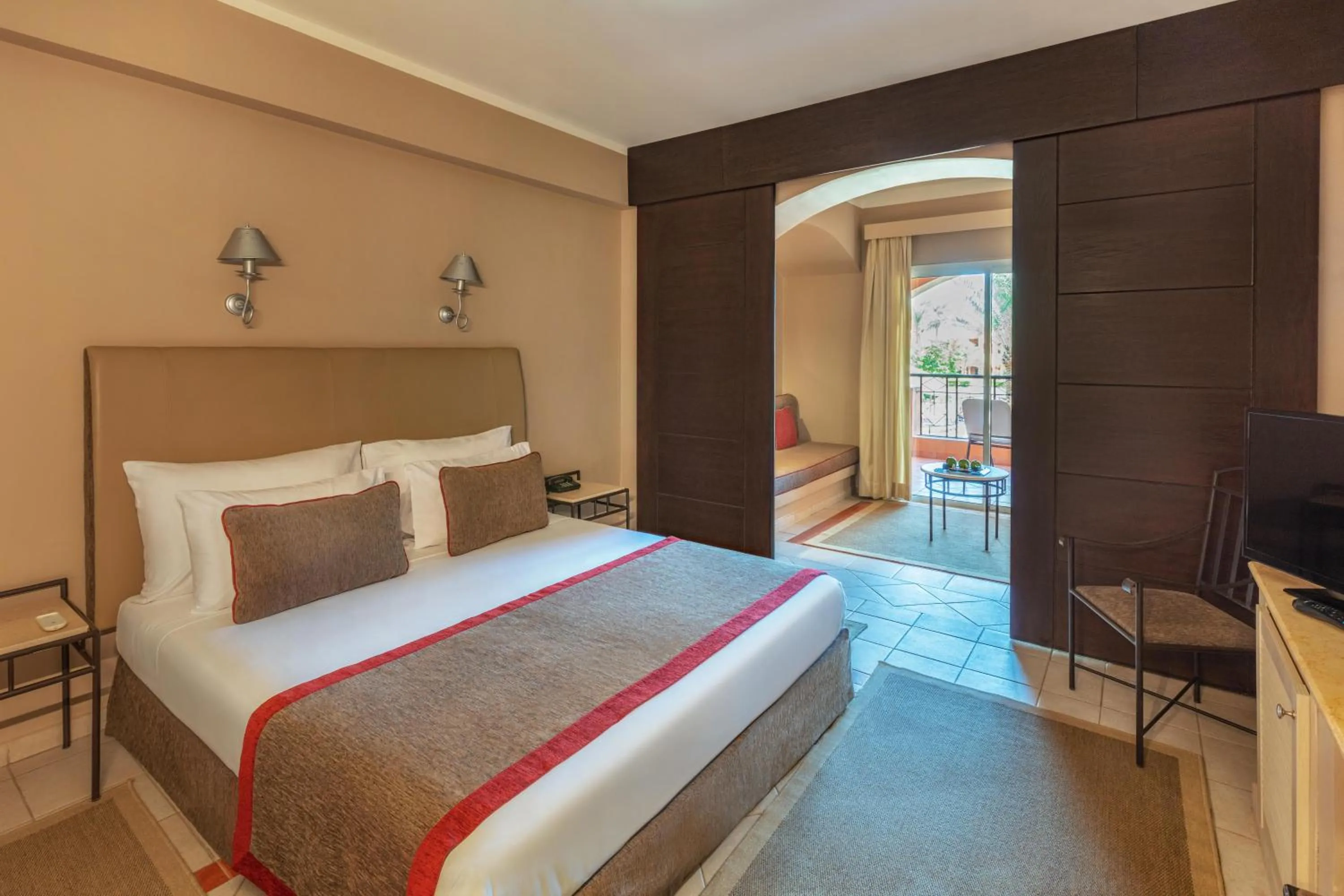 Photo of the whole room, Bed in JAZ Makadi Oasis Resort