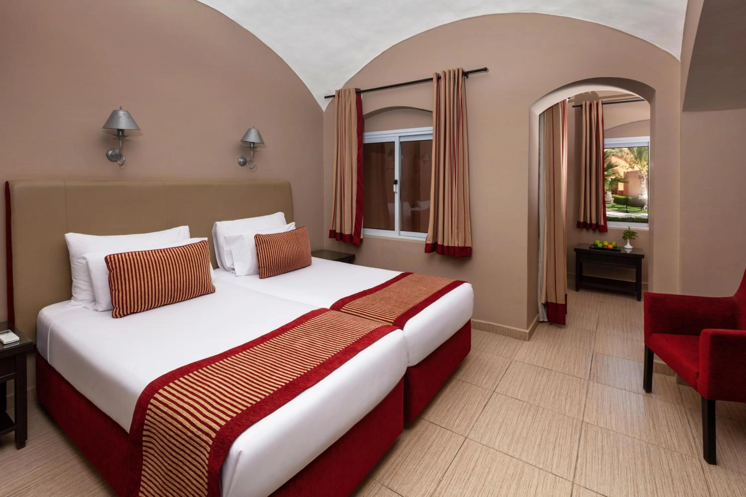 Photo of the whole room, Bed in JAZ Makadi Oasis Resort