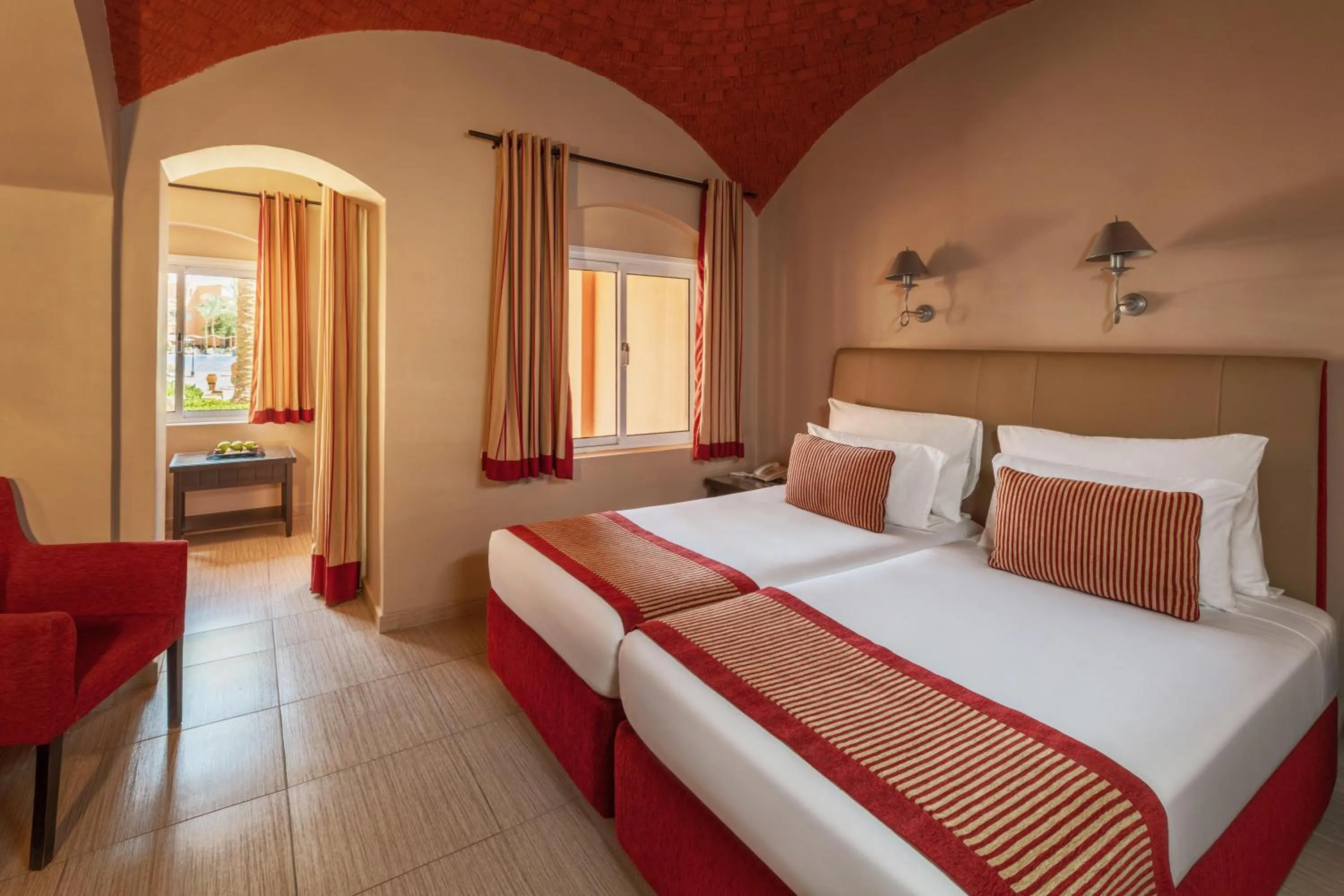 Photo of the whole room, Bed in JAZ Makadi Oasis Resort