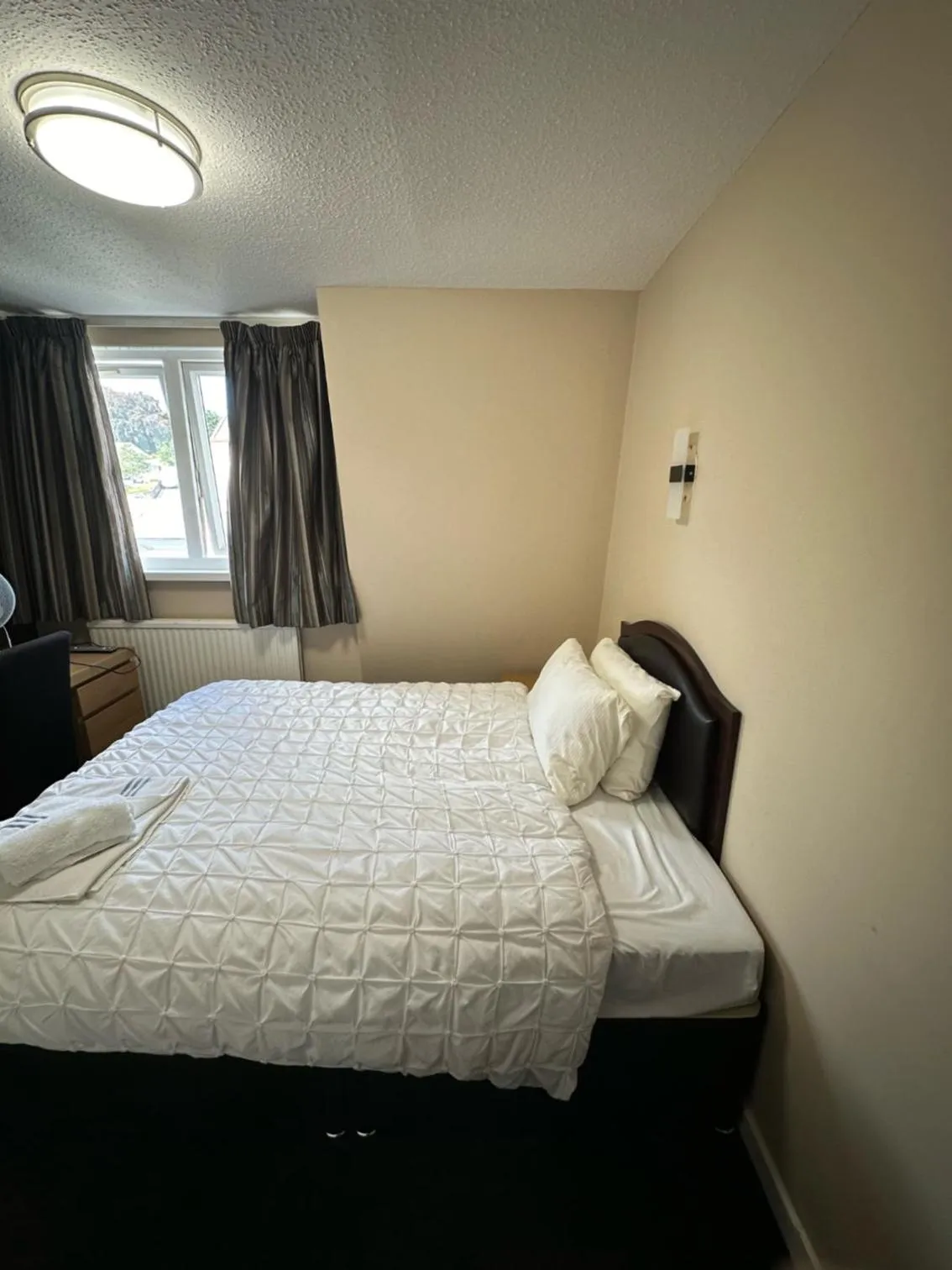 Bed in Burnett Arms Hotel