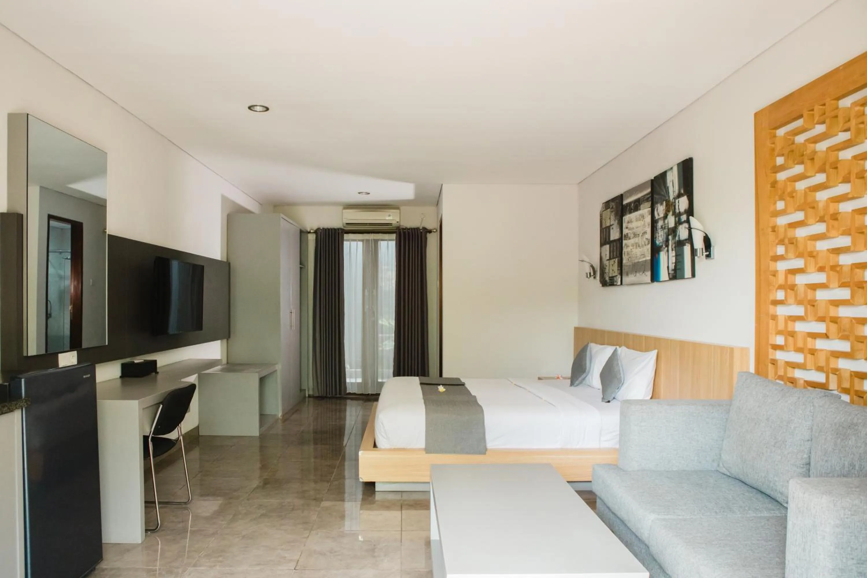 Bedroom in Grand Kesambi Resort and Villas Seminyak