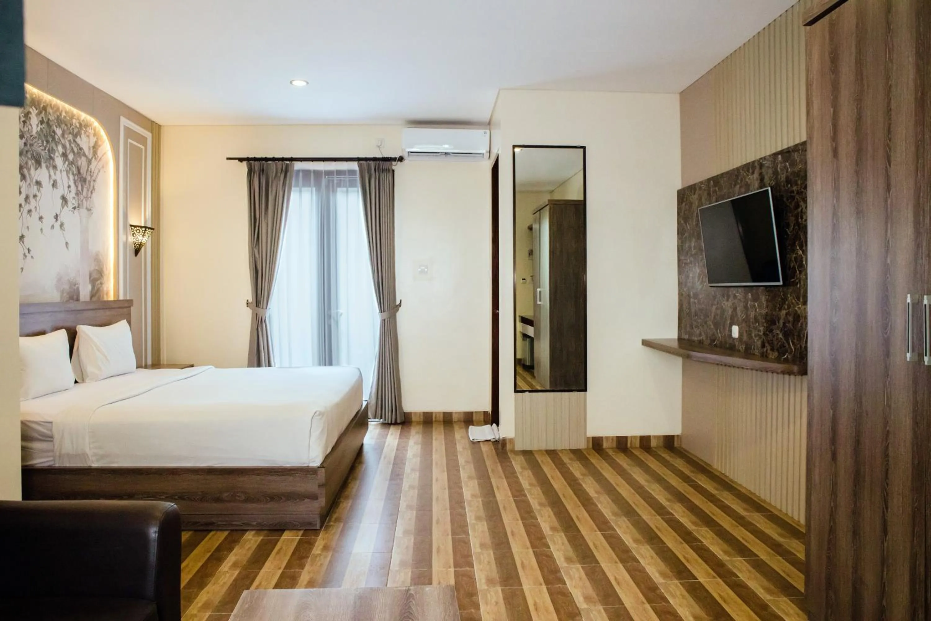 Bedroom, Bed in Grand Kesambi Resort and Villas Seminyak