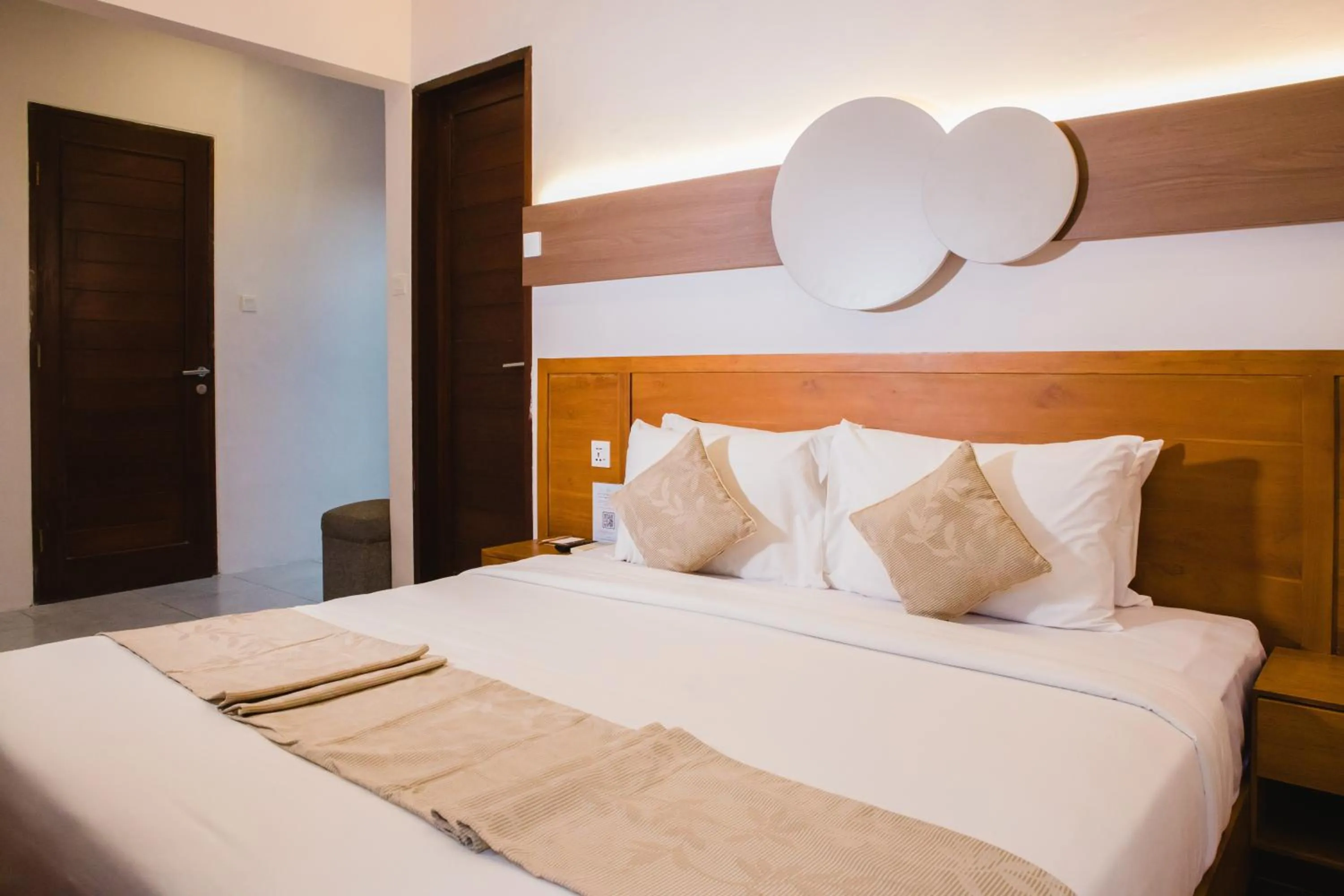 Bed in Grand Kesambi Resort and Villas Seminyak